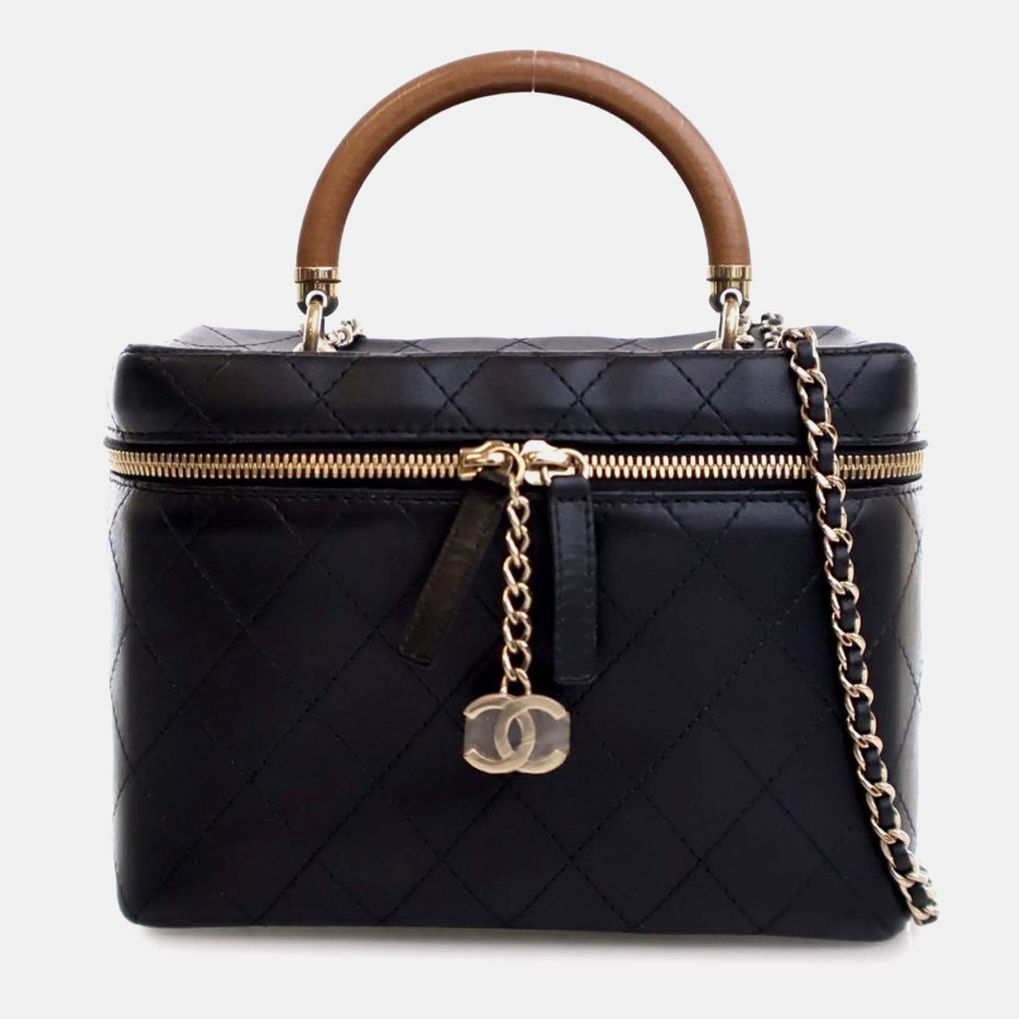 

Chanel Black/Brown Large Quilted Lambskin Knock On Wood Vanity Case