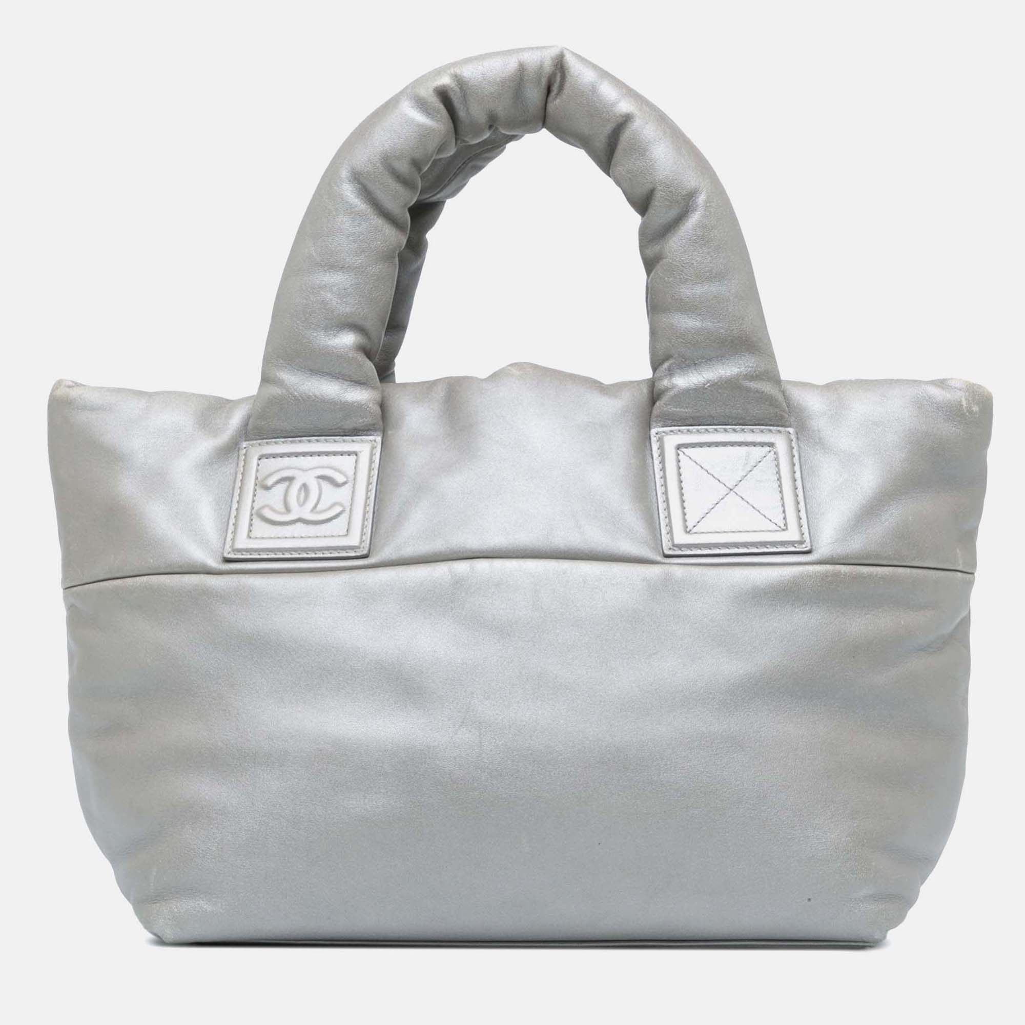 

Chanel Silver Small Lambskin Coco Cocoon Reversible Tote