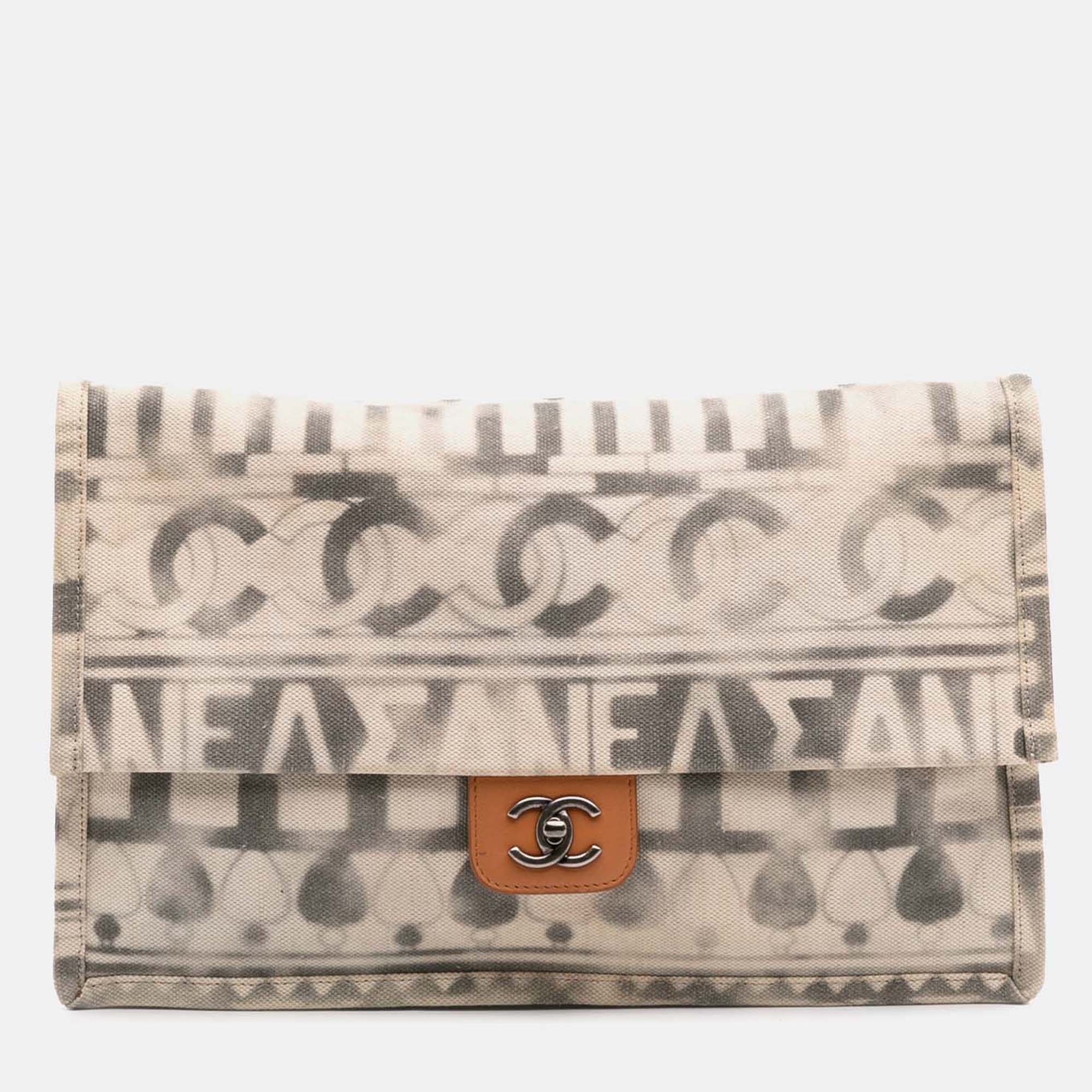 

Chanel Beige/Grey Canvas Iliad Flap Clutch