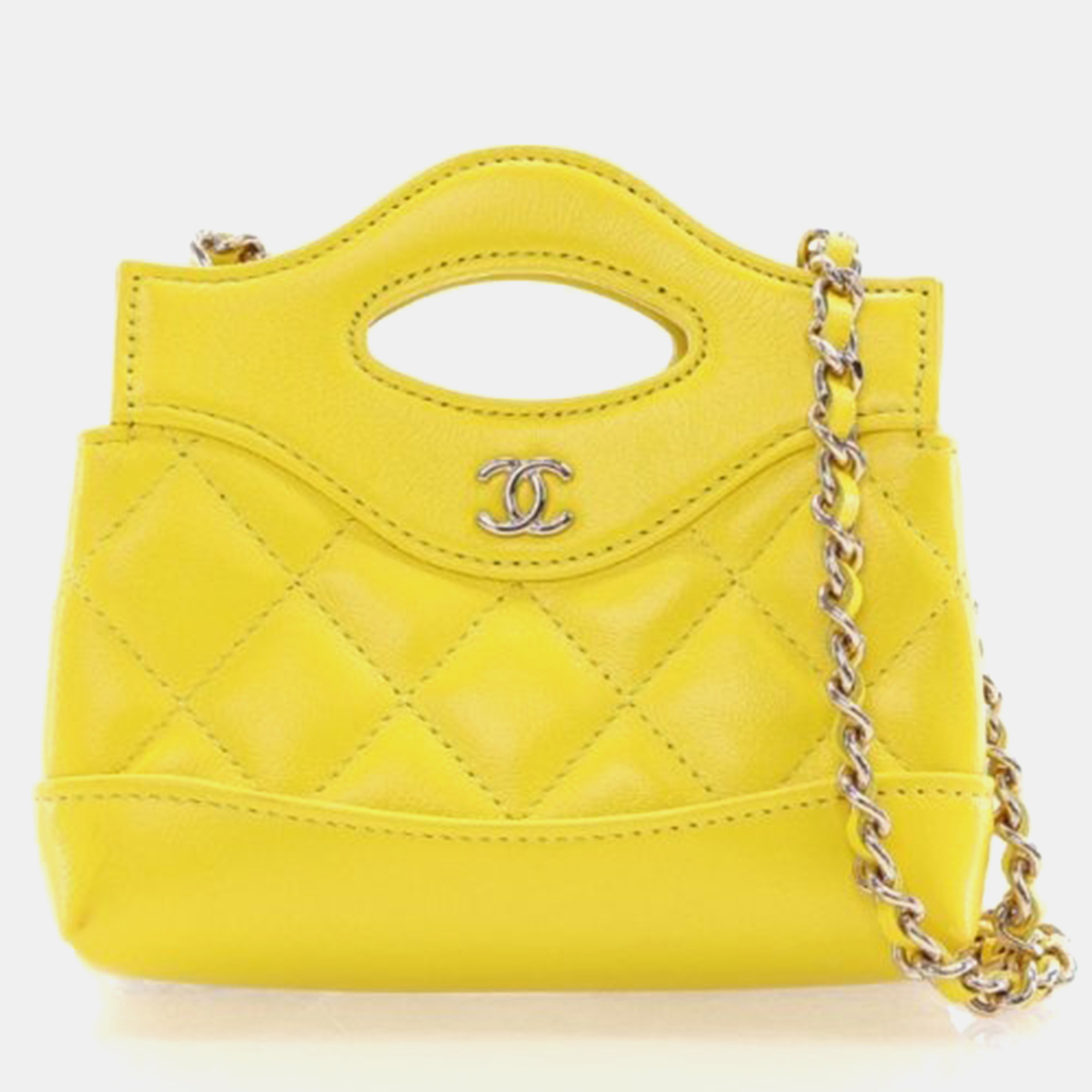 

Chanel Mini Yellow Shiny Lambskin 31 Clutch
