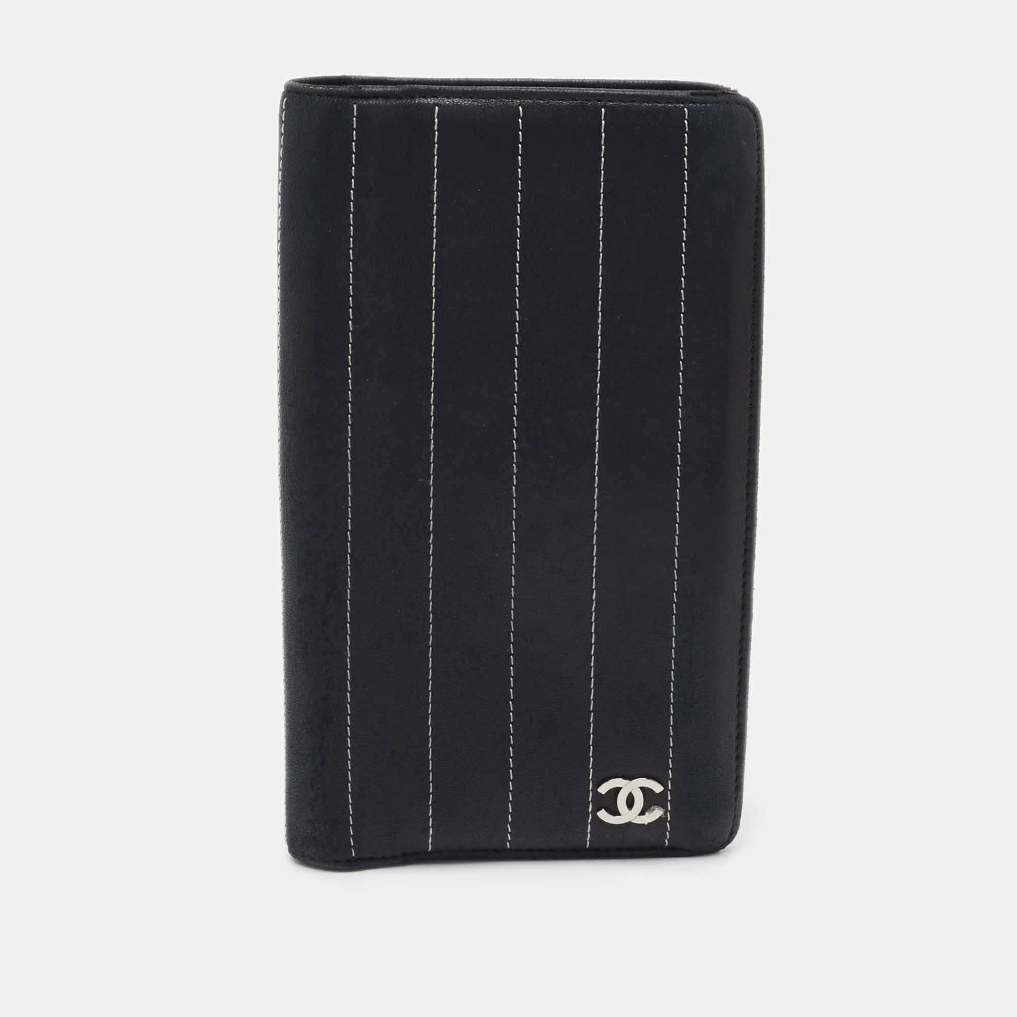 

Chanel Black Striped Leather Vertical CC Wallet