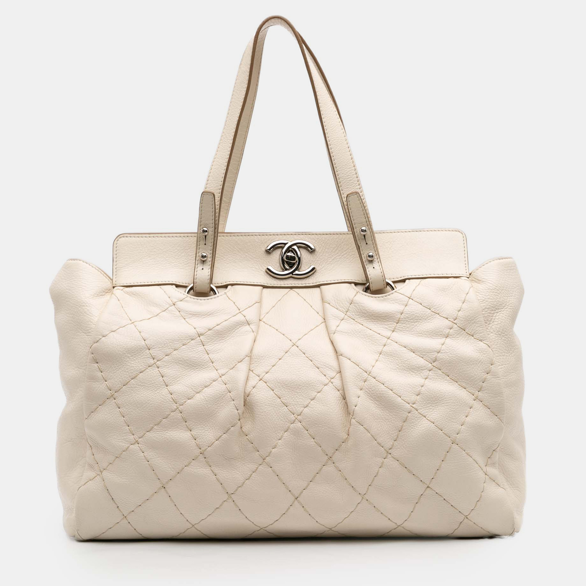 

Chanel Beige Large Quilted Aged Calfskin On The Road Tote