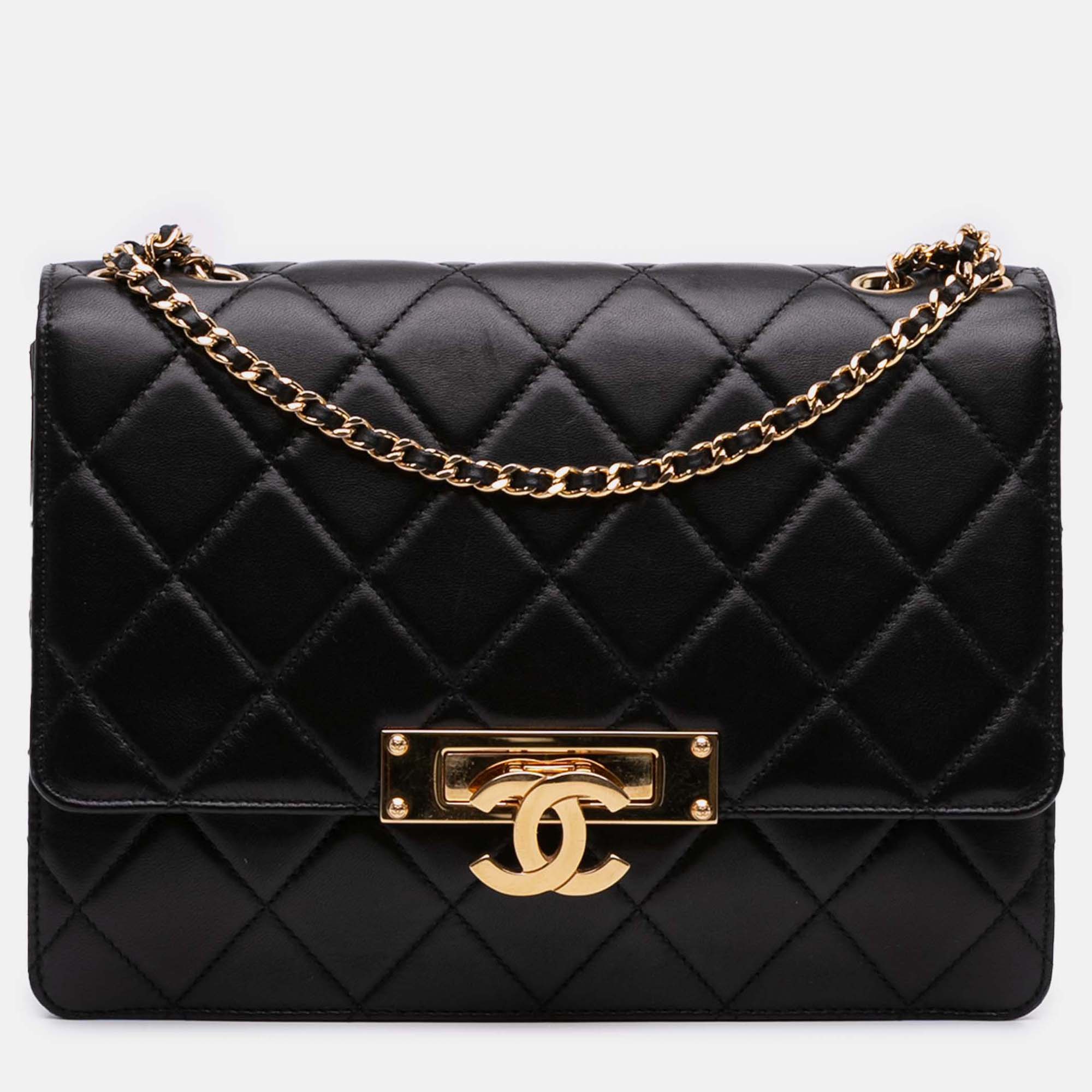 

Chanel Black Medium Quilted Lambskin Golden Class Flap