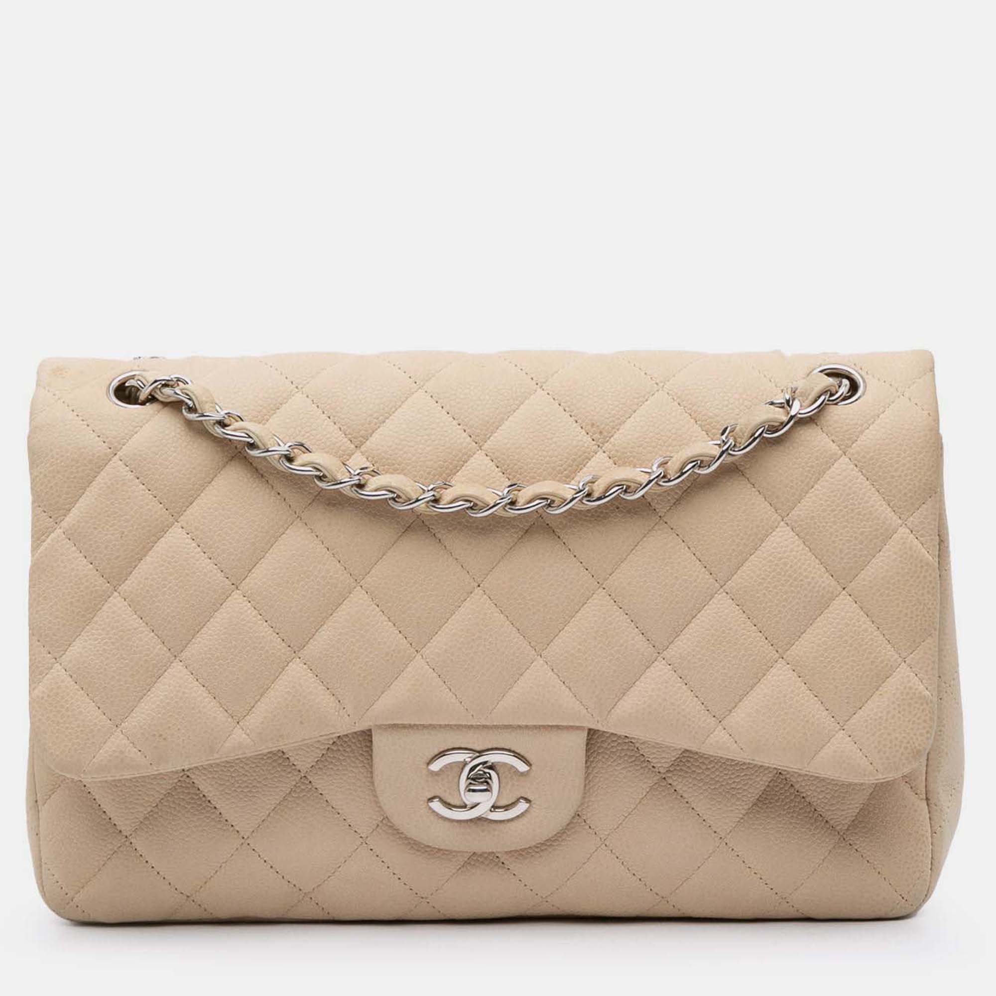 

Chanel Classic Double Flap Jumbo Caviar Shoulder Bag, Beige