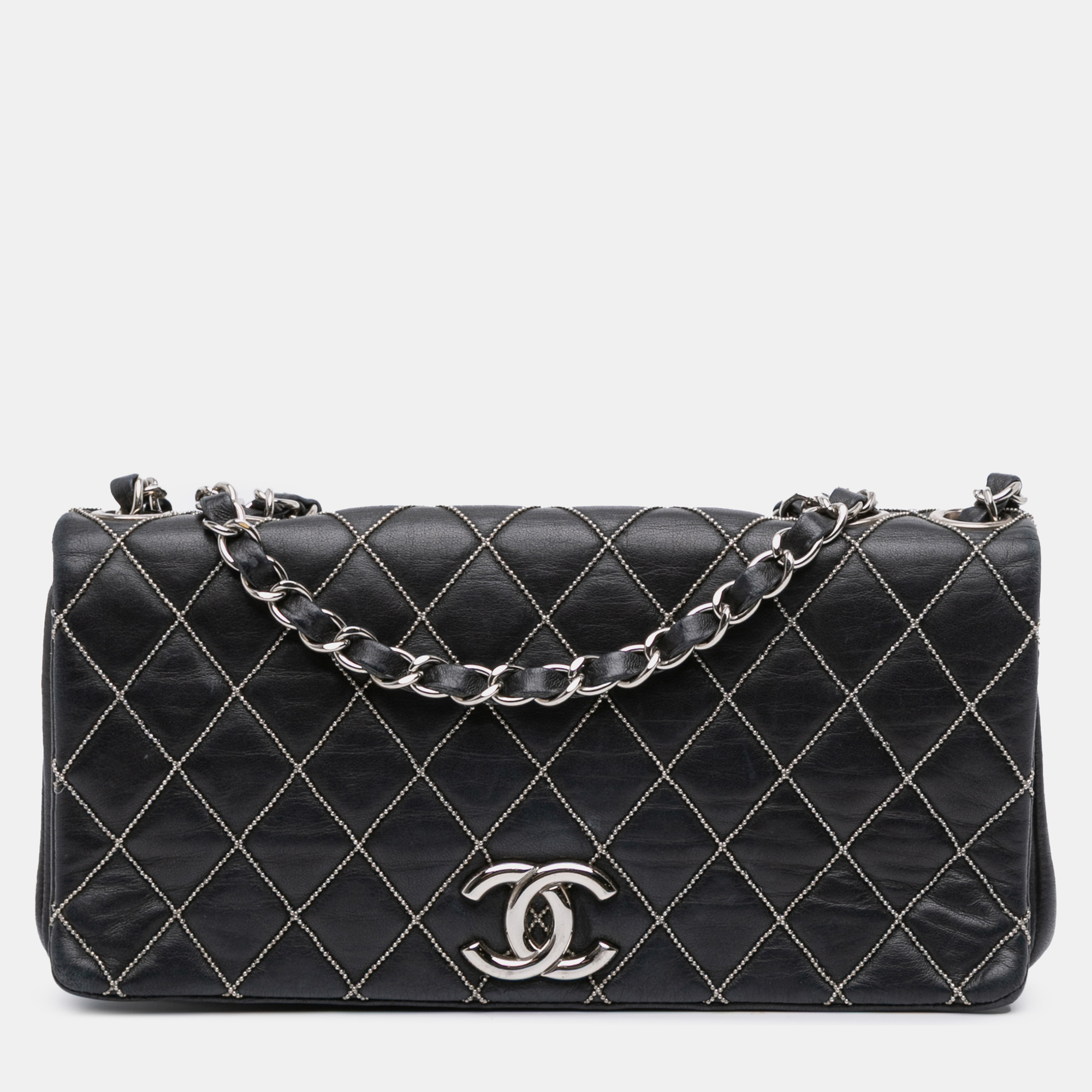 

Chanel Black Quilted Lambskin Studded Metal Beauty Flap
