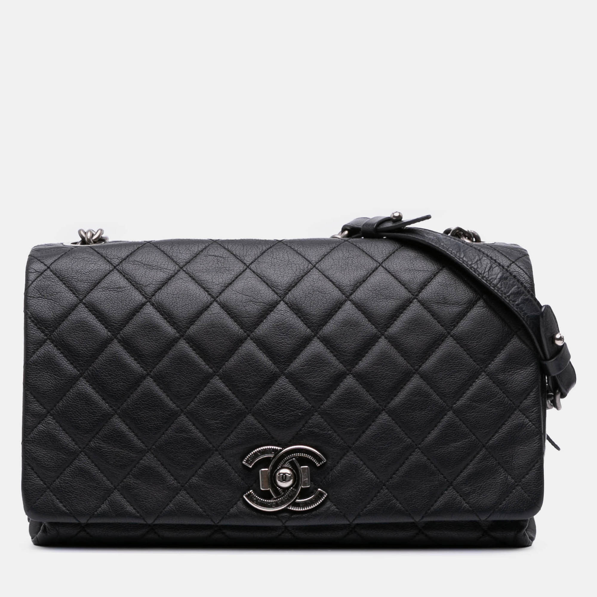 

Chanel Black Large Quilted Goatskin City Rock Flap