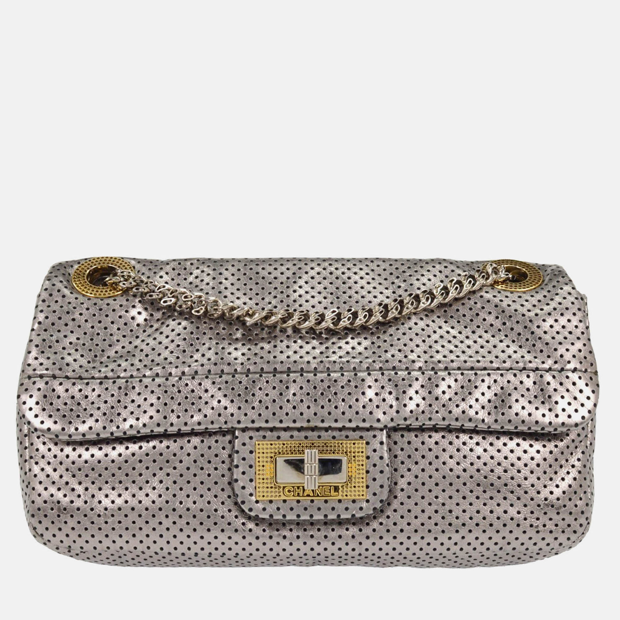 

Chanel Silver Perforated Mademoiselle Lock Single Flap Shoulder Bag