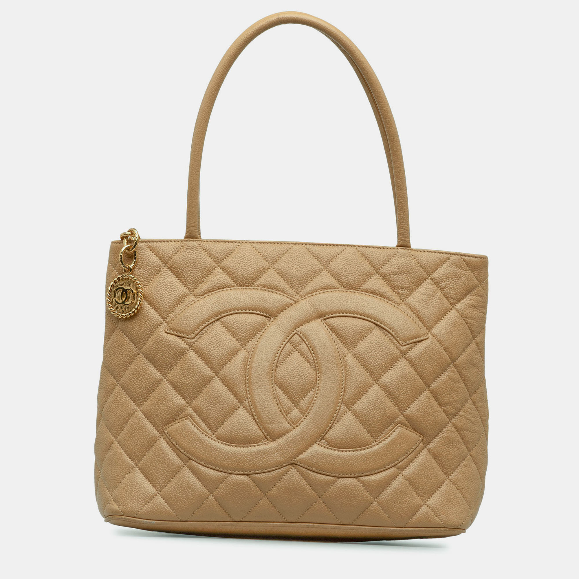 

Chanel Beige Caviar Medallion Tote