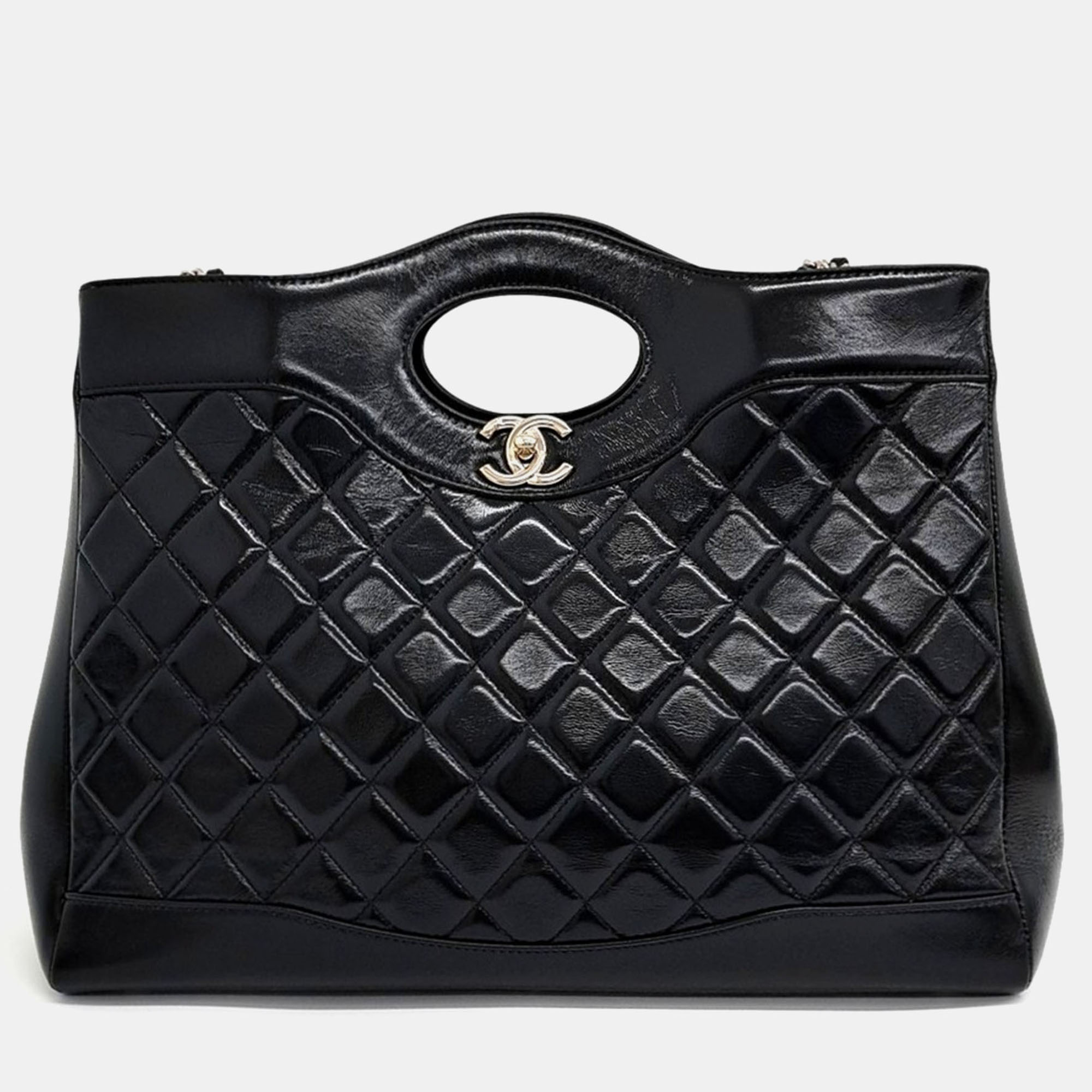 

Chanel Black Leather 31 shopping bag