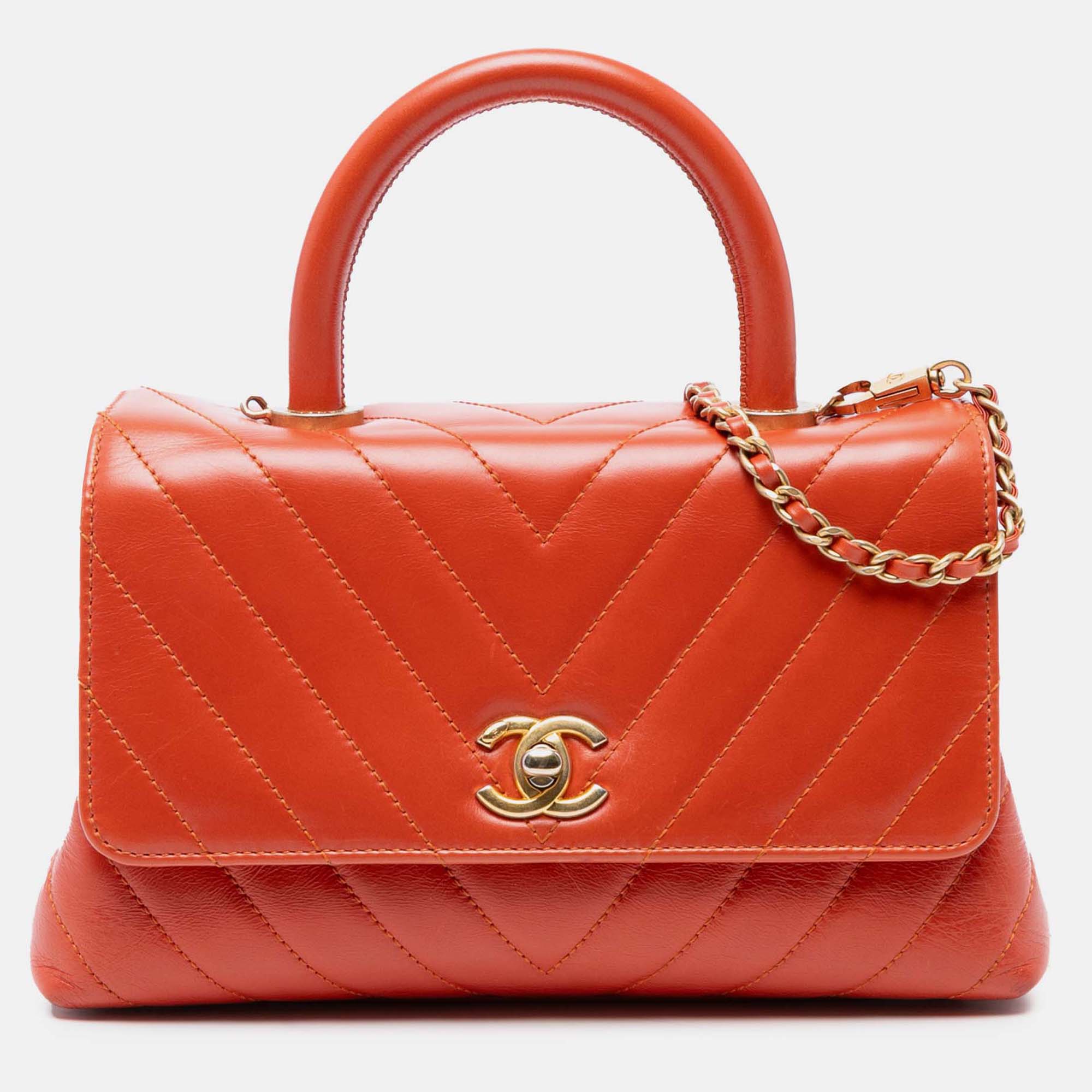

Chanel Orange Mini Chevron Lambskin Coco Top Handle Bag