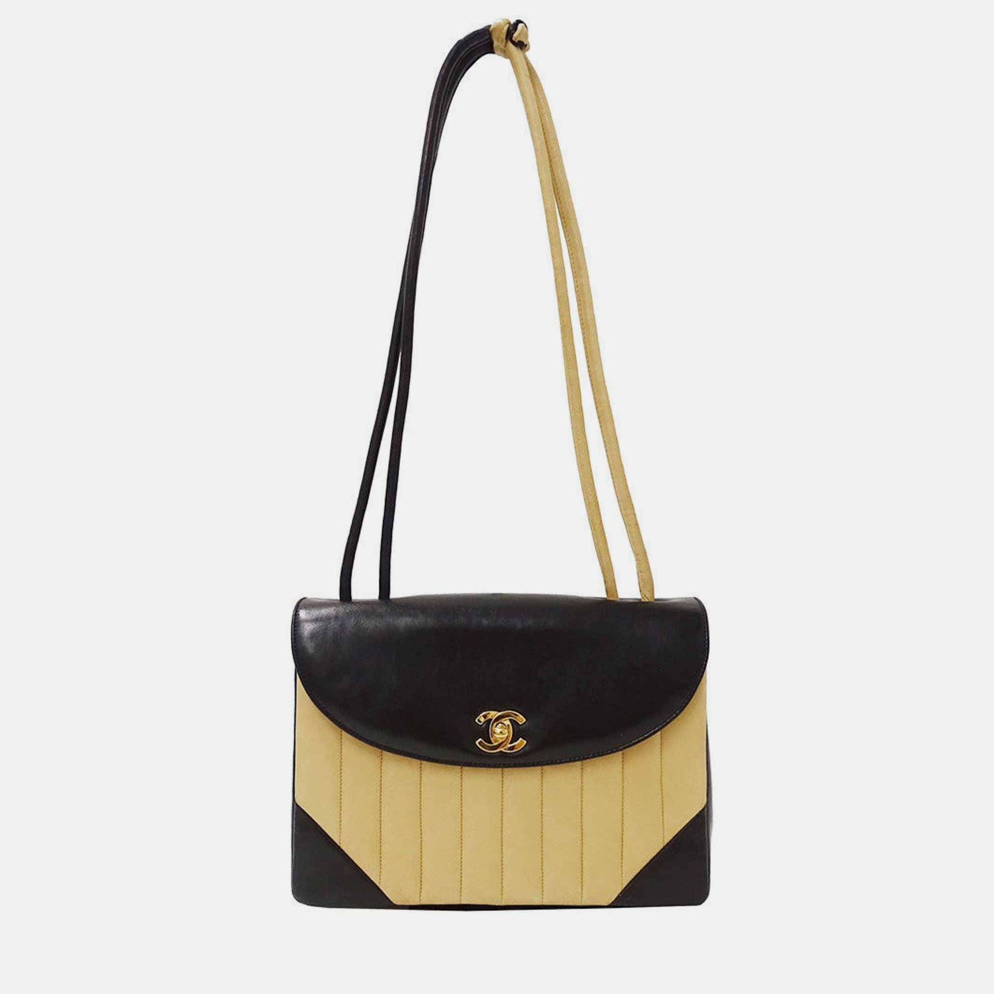 

Chanel Mademoiselle Shoulder Bag In Black And Beige Lambskin