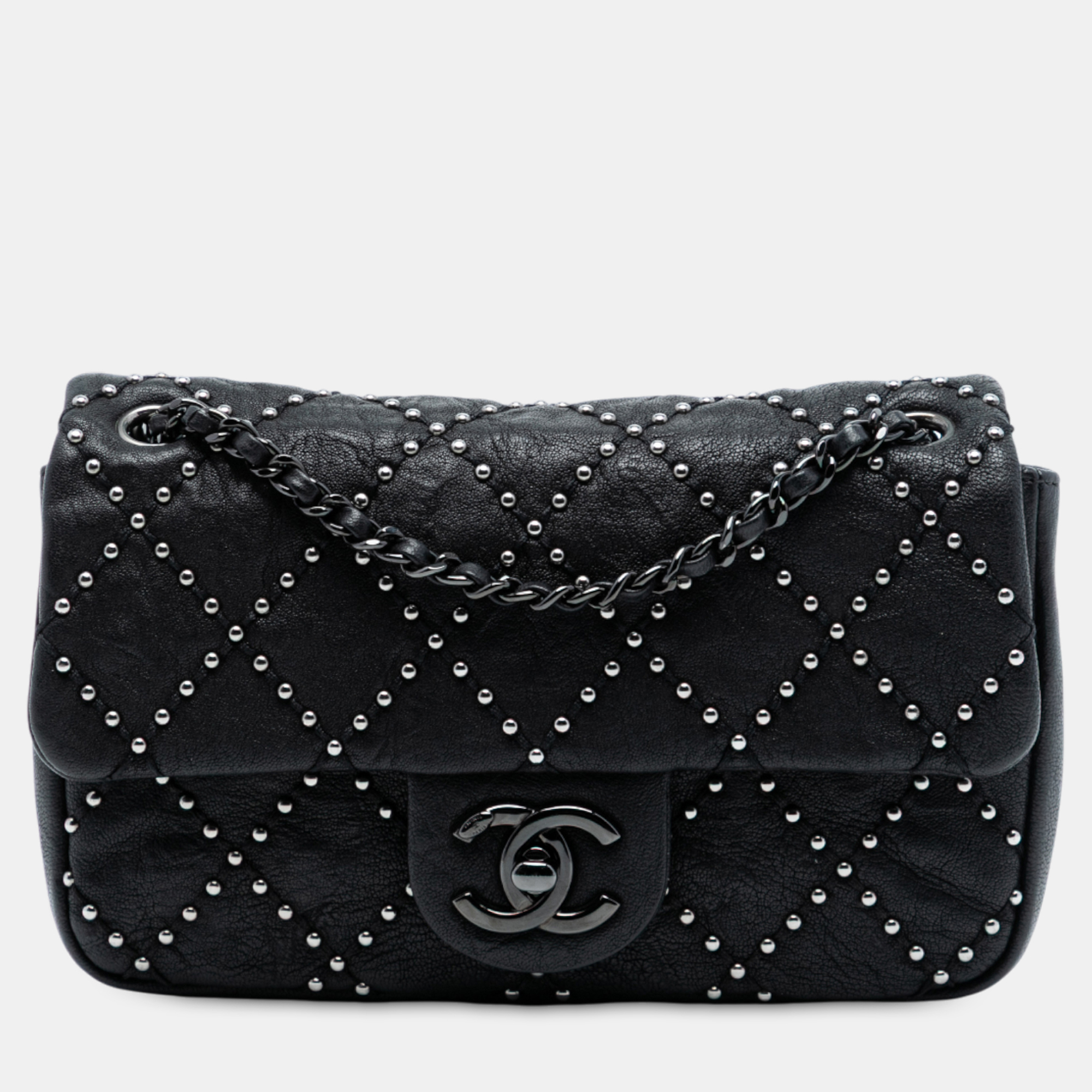 

Chanel Black Small Quilted Distressed Calfskin Studded Metal Beauty Flap