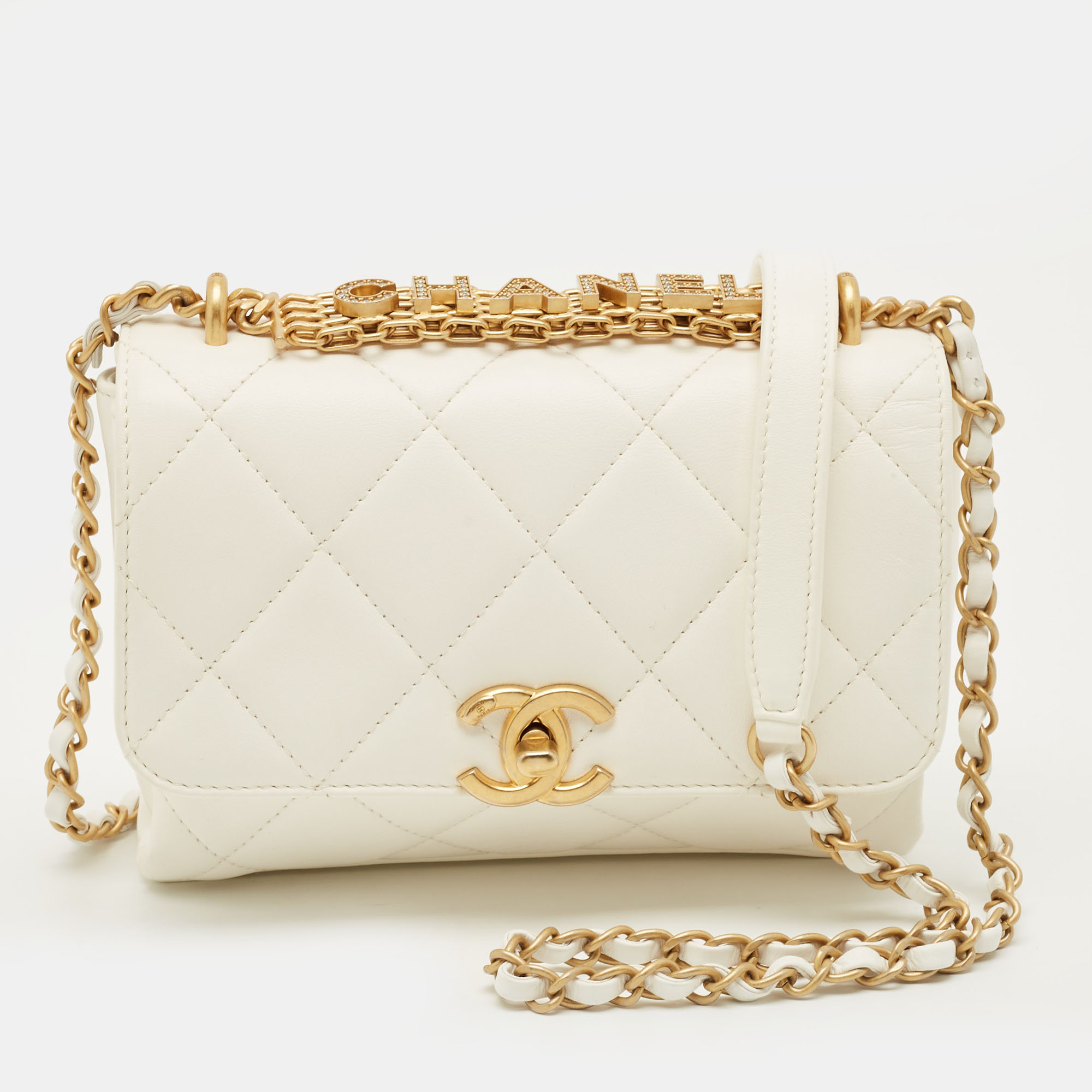 

Chanel CC Crystal Logo Off White Quilted Leather Flap Bag