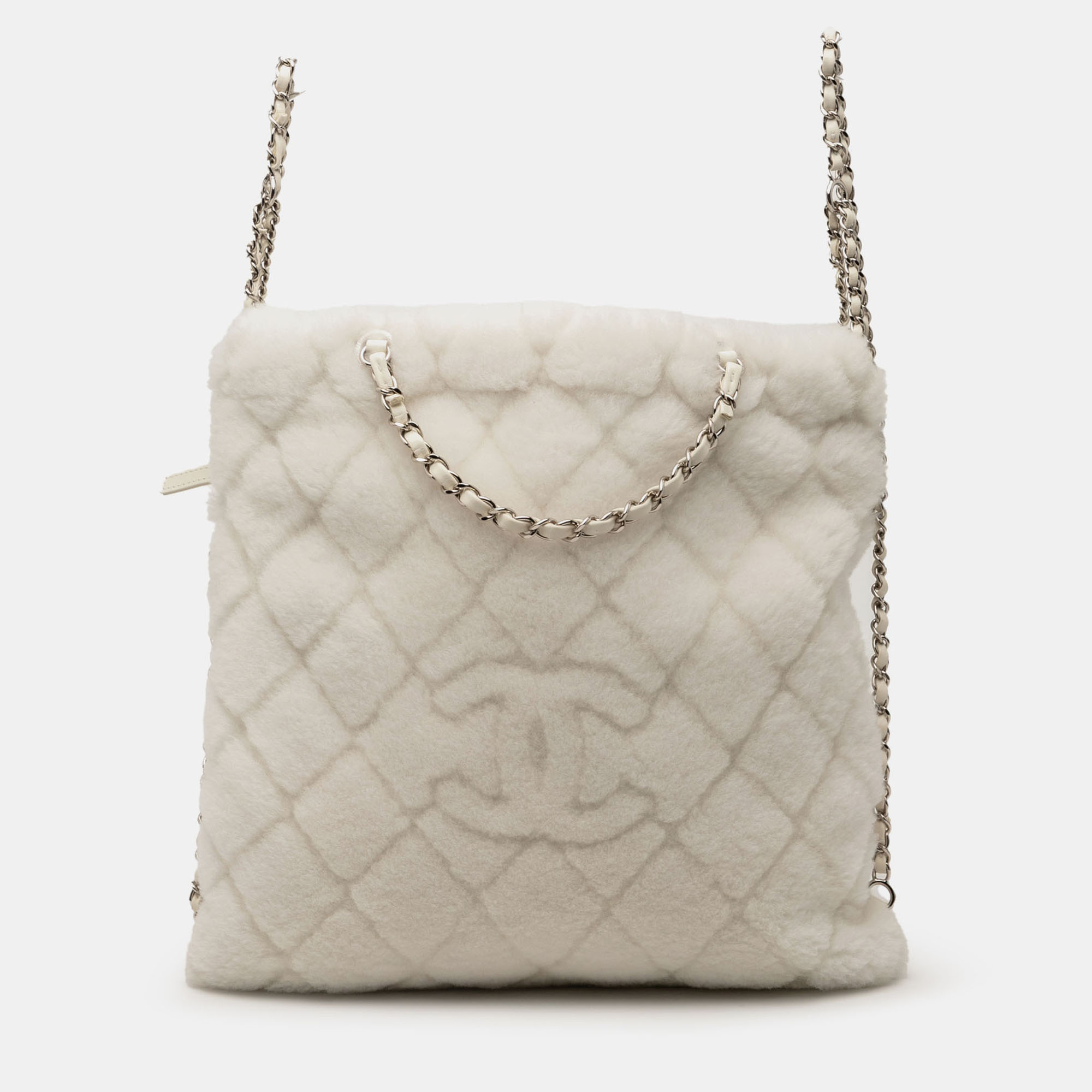 Click to view more detailed imagery on our partner's website Pre-owned Chanel White Cc Shearling Coco Neige Backpack