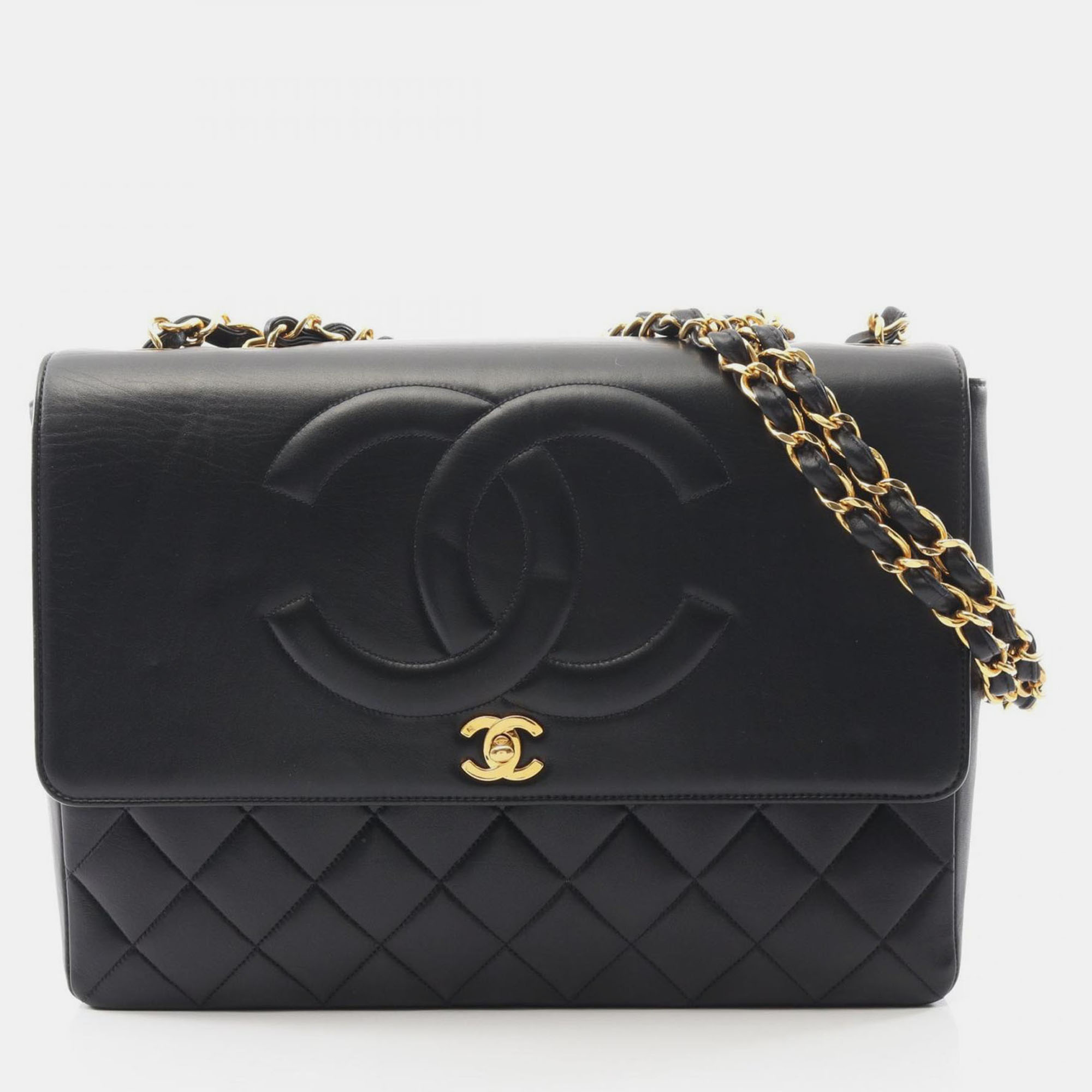 

Chanel Vintage CC Maxi Jumbo Black Lambskin Quilted Flap Bag