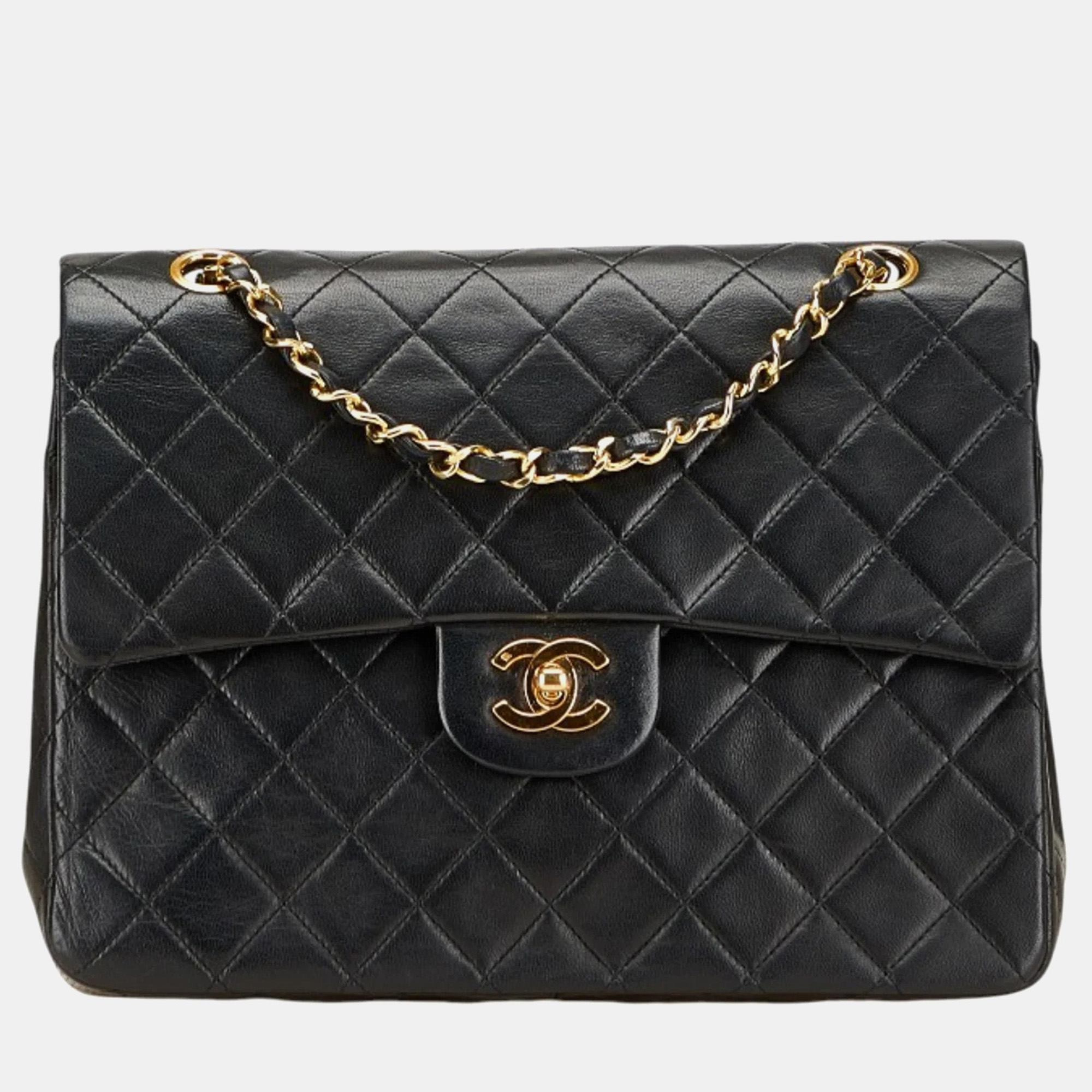

Chanel Matelasse Coco Mark Double Flap Shoulder Bag In Black And Gold Lambskin