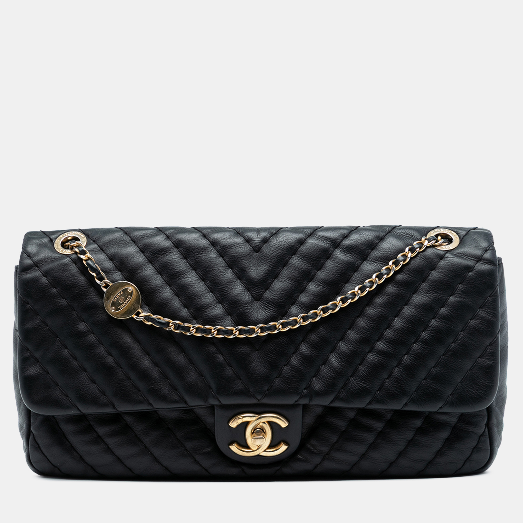 

Chanel Black Jumbo Chevron Iridescent Calfskin Surpique Flap