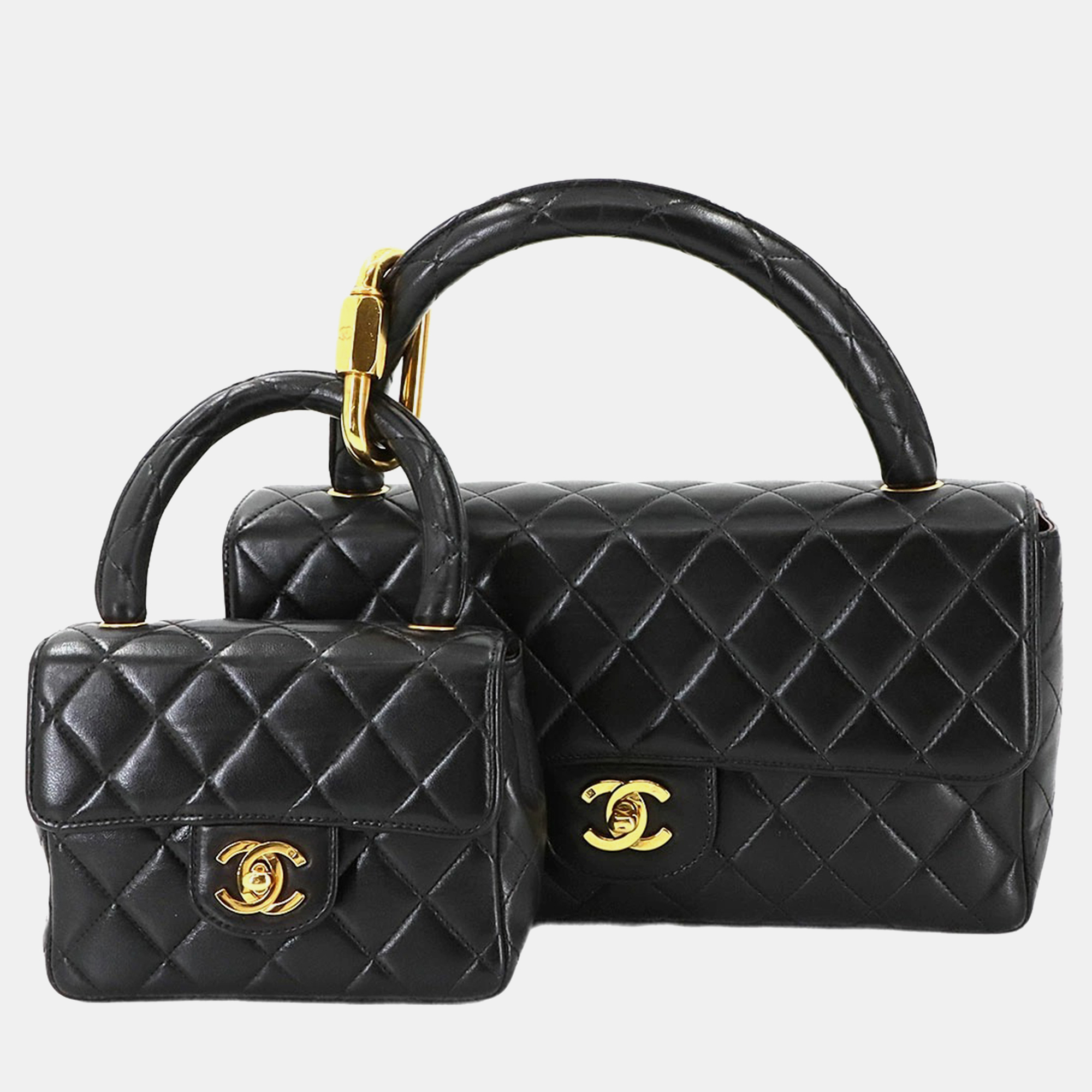 

Chanel Vintage Twin Flap Set Black Leather Handbags