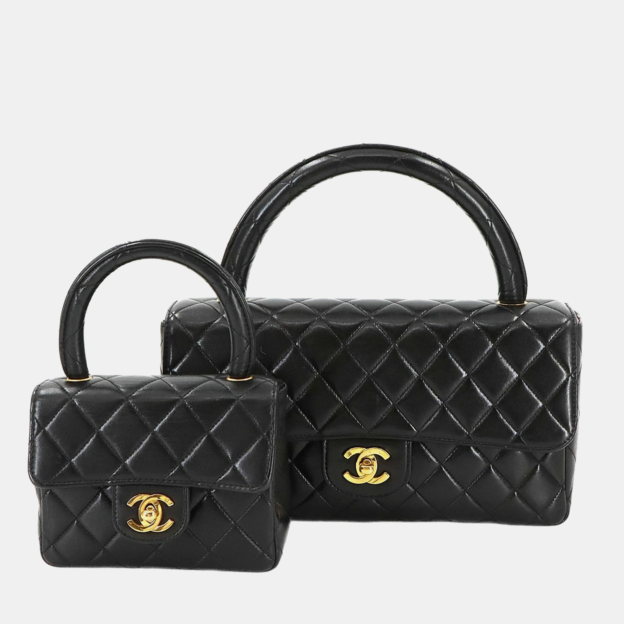 

Chanel Vintage Twin Flap Set Black Leather Handbags