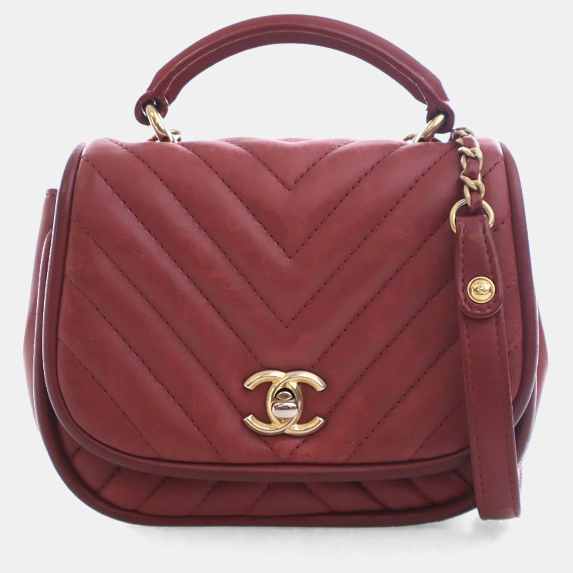 

Chanel Mini Red Lambskin Reversed Round Flap Bag