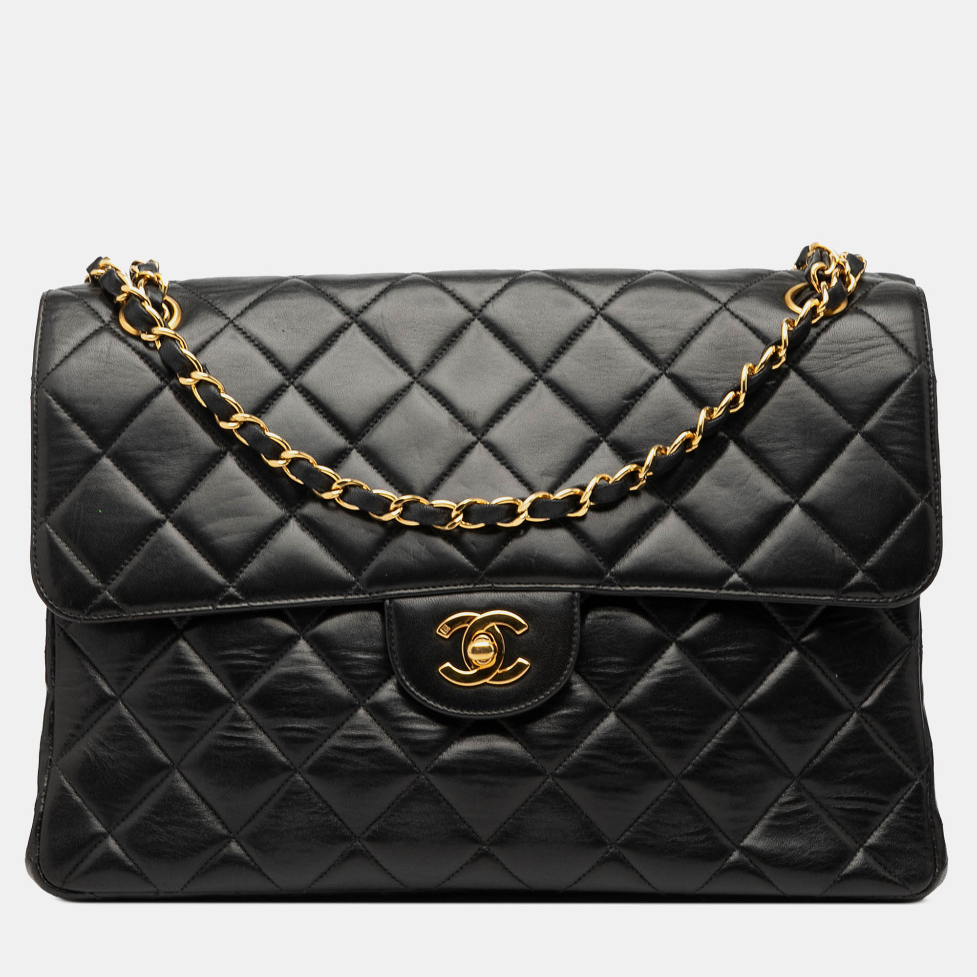 

Chanel Black Jumbo Quilted Lambskin Double Sided Flap