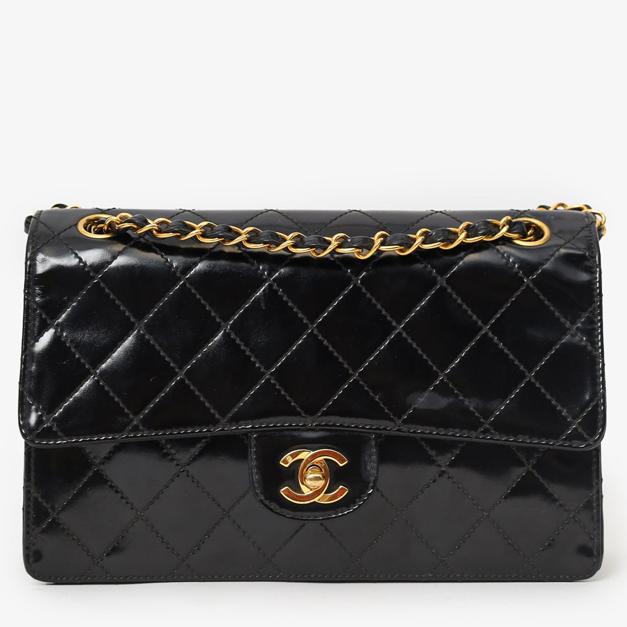 

Chanel 1996-97 Black Quilted Patent Leather CC Flap Bag