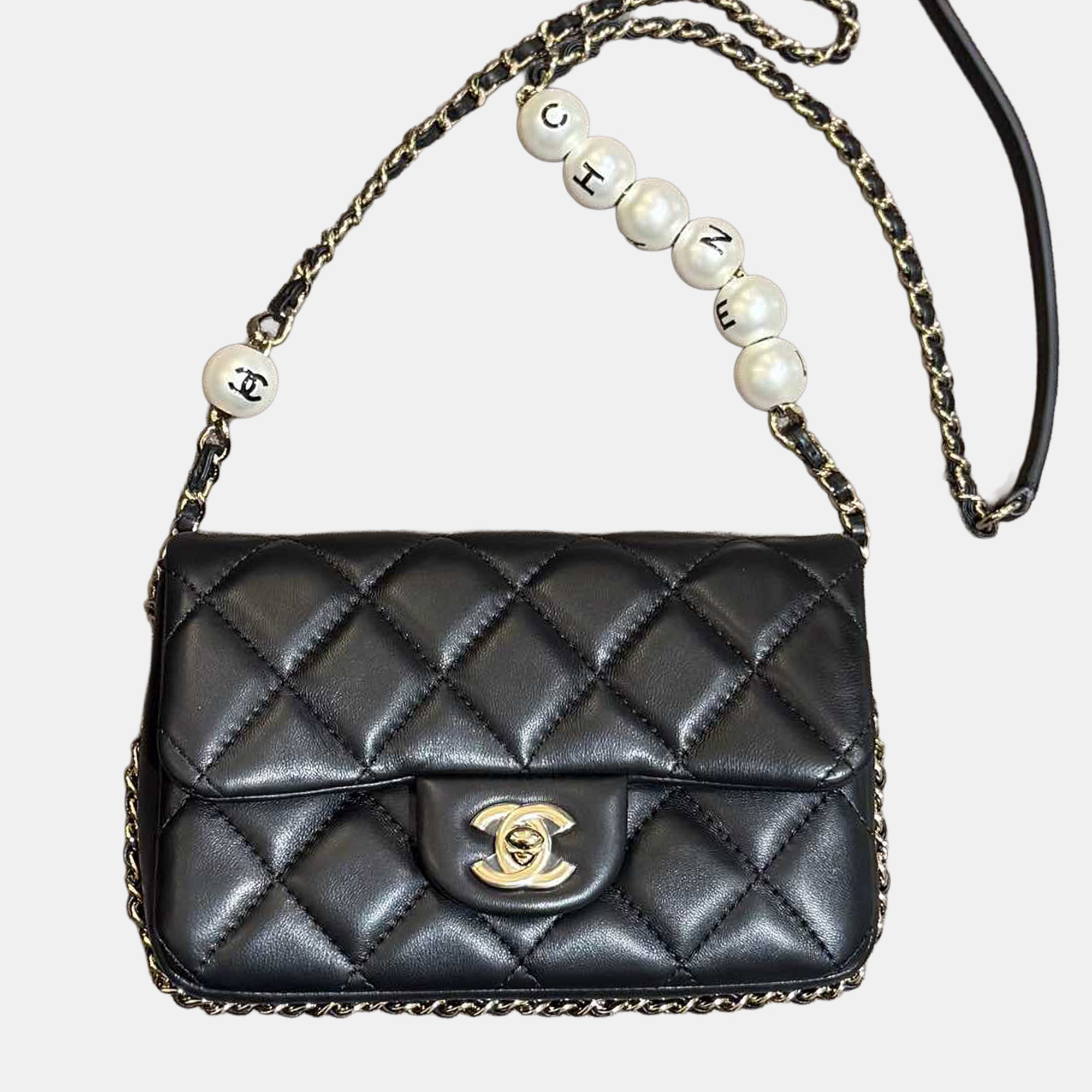

Chanel Mini Flap Bag Black with Gold Hardware Pearl Logo