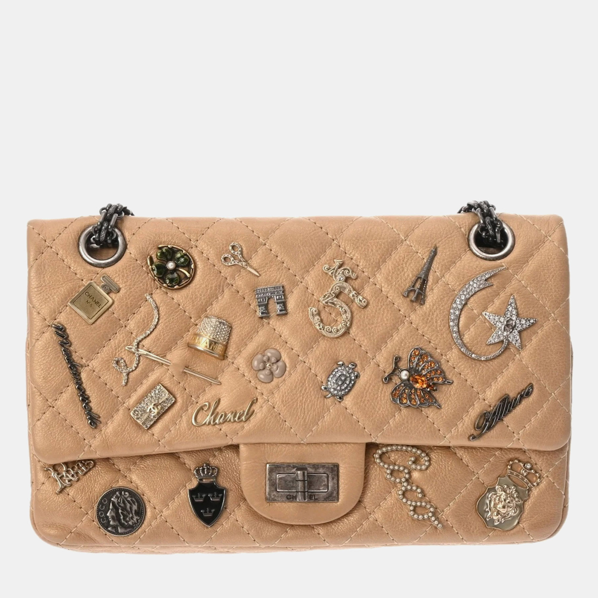 

Chanel Matelasse  Icon Charm Double Flap Beige Gold Calfskin