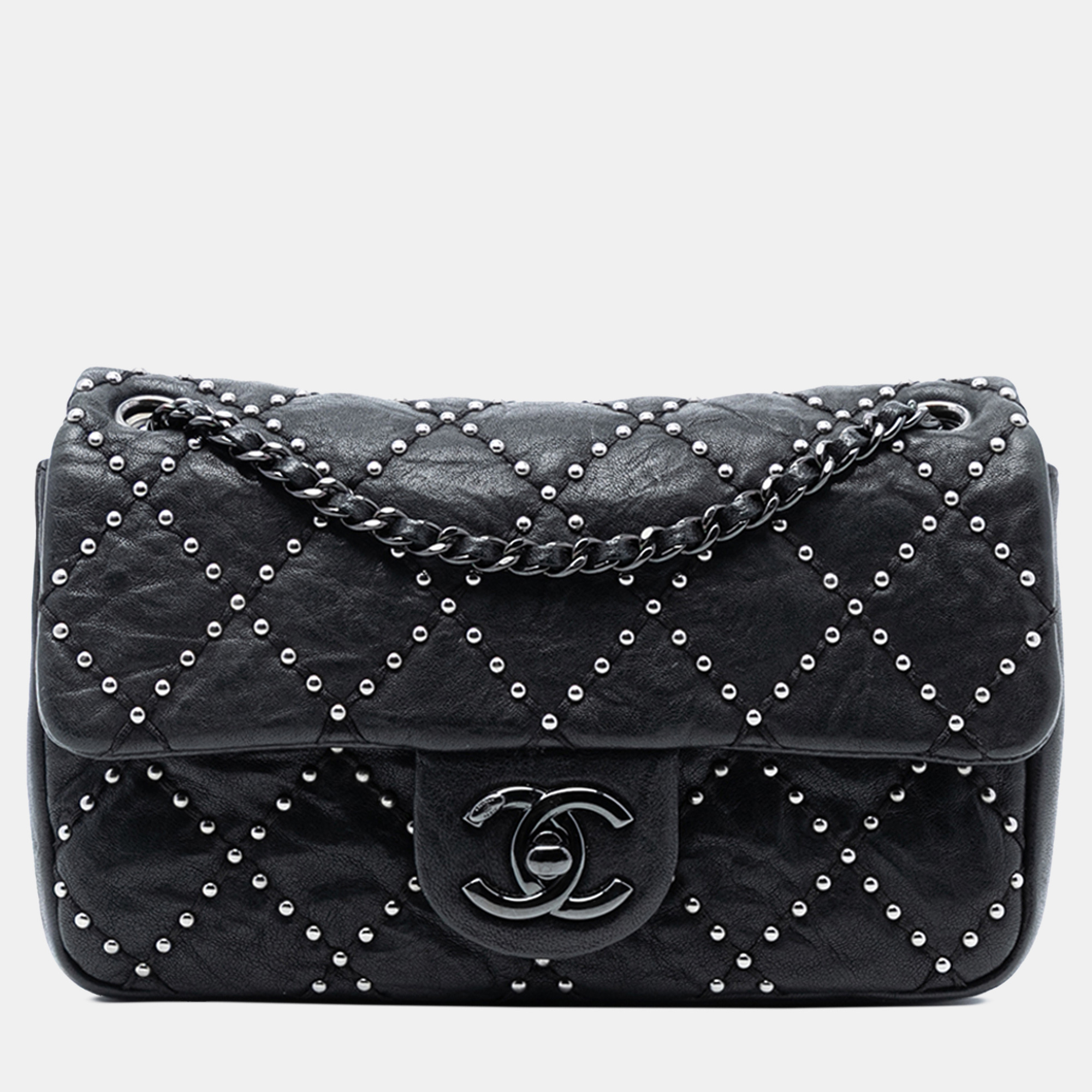 

Chanel Black Small Quilted Distressed Calfskin Studded Metal Beauty Flap