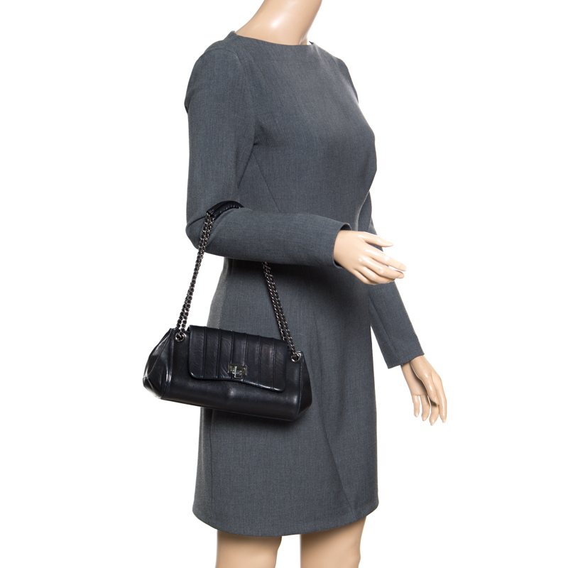 

Chanel Black Vertical Quilted Leather Accordion Flap Bag