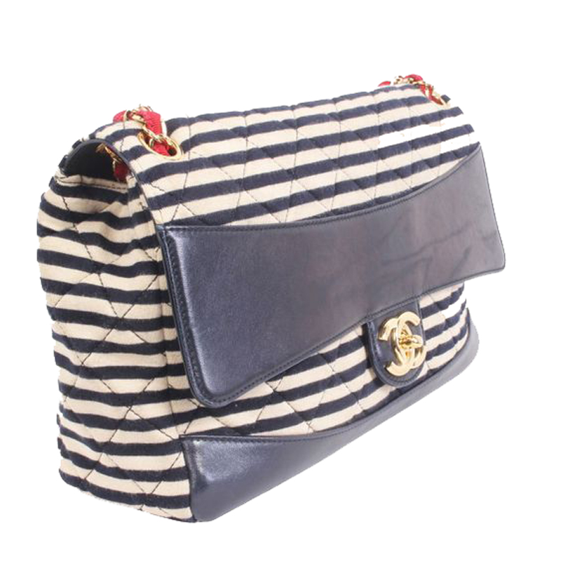 

Chanel Blue Stripes Canvas And Leather Trimmed Jumbo Flap Bag, Navy blue