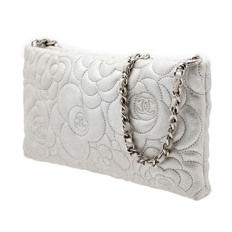 

Chanel Silver Camellia Embossed Leather WOC Clutch Bag
