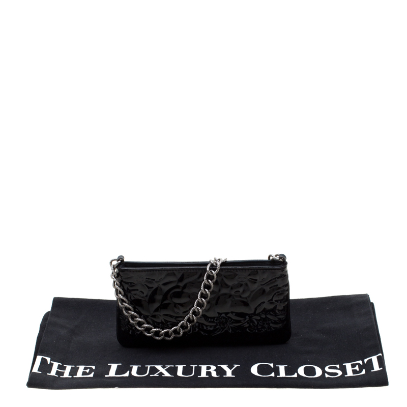 Chanel Black Camellia Embossed Patent Leather Mini Pochette Bag - Yoogi's  Closet