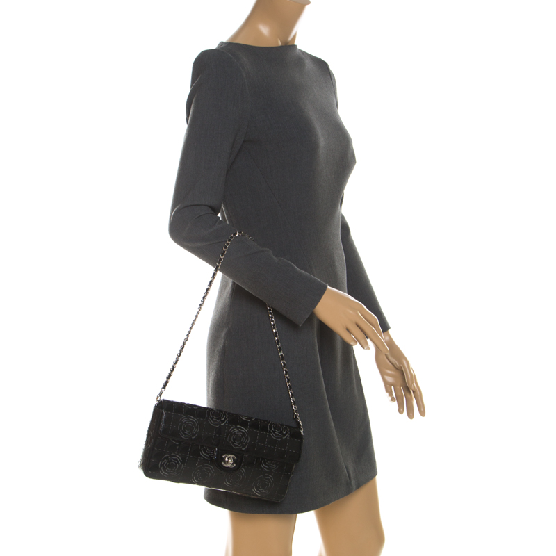 

Chanel Black Patent Leather Camellia Chain Laser Cut East West Shoulder Bag
