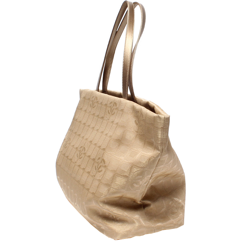 

Chanel Beige Canvas Tote Bag