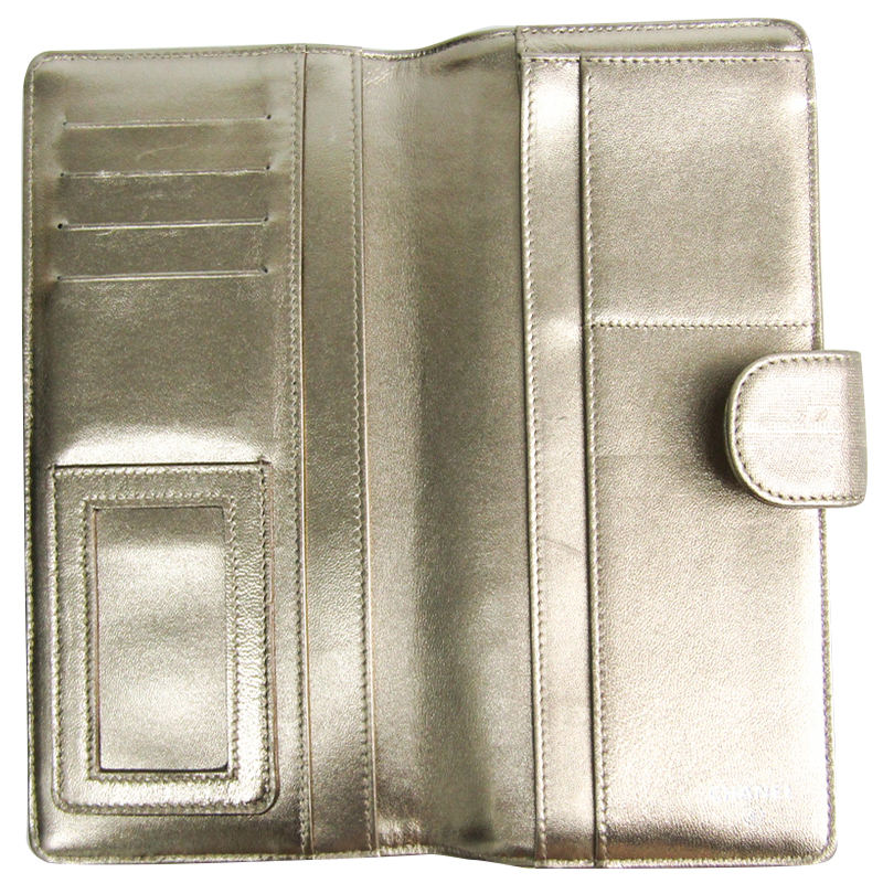 

Chanel Gold Coated Canvas New Travel Line Wallet