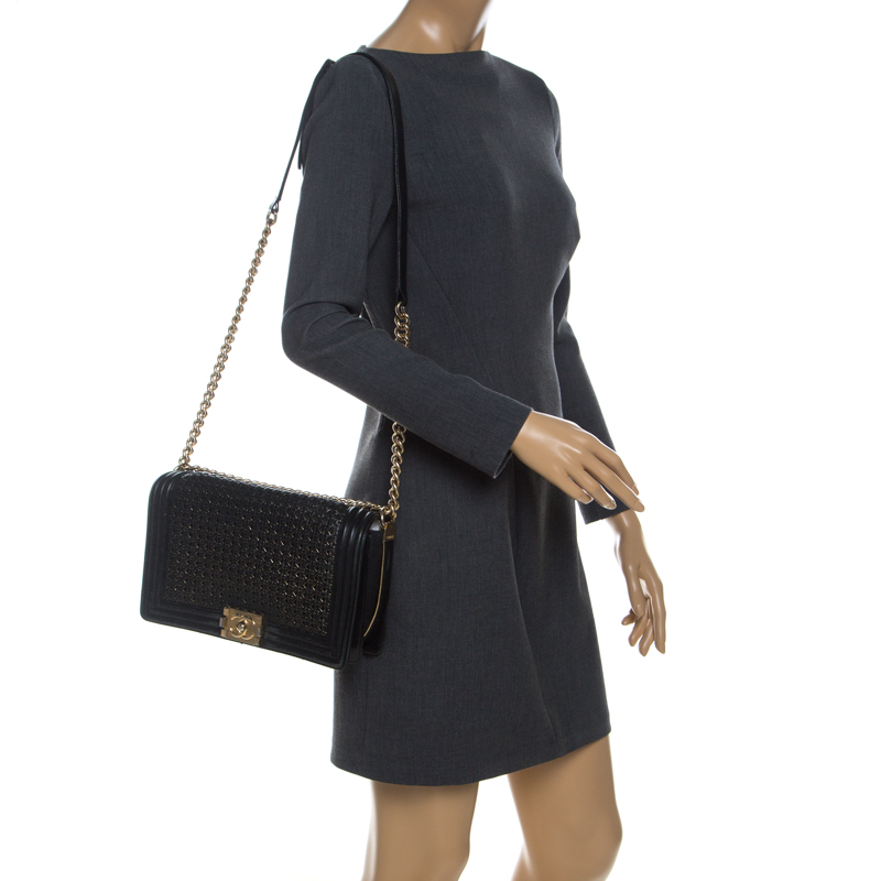 

Chanel Black Woven Leather New Medium Reverso Boy Flap Bag