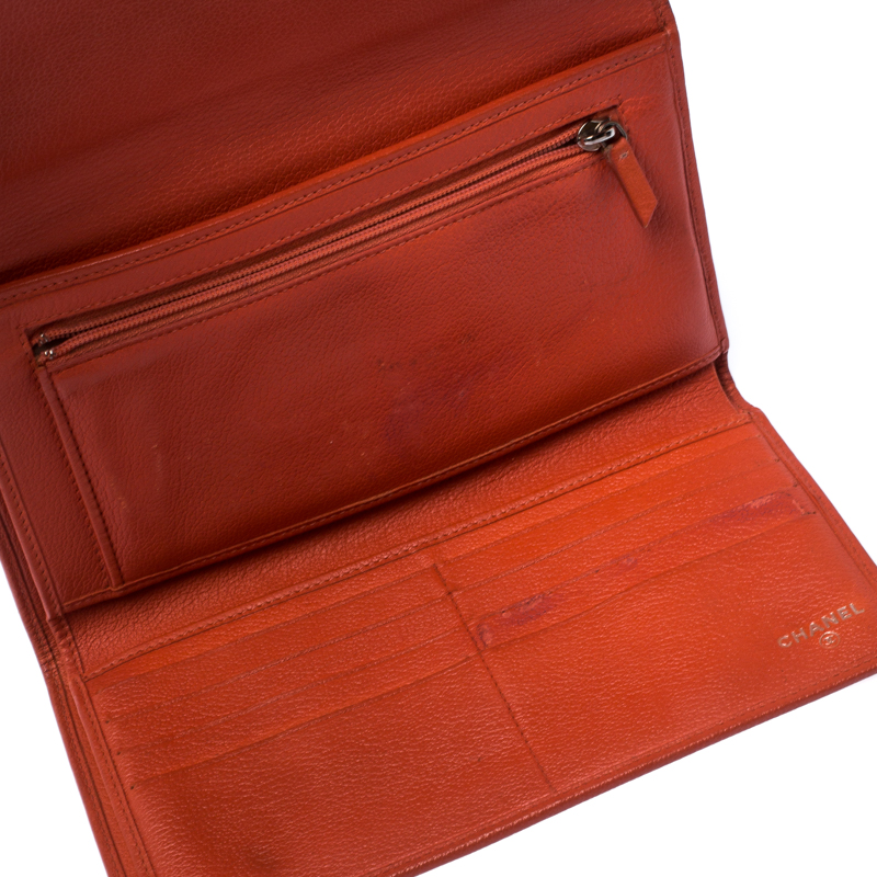 

Chanel Orange Leather Camellia Trifold Wallet