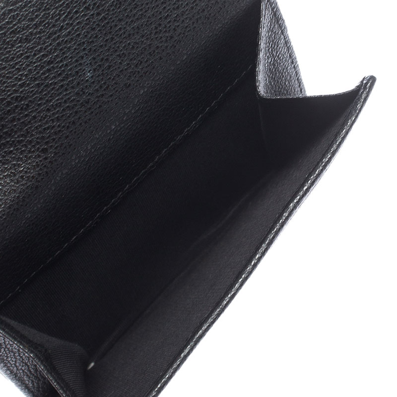 

Chanel Black Leather Camellia Compact Wallet