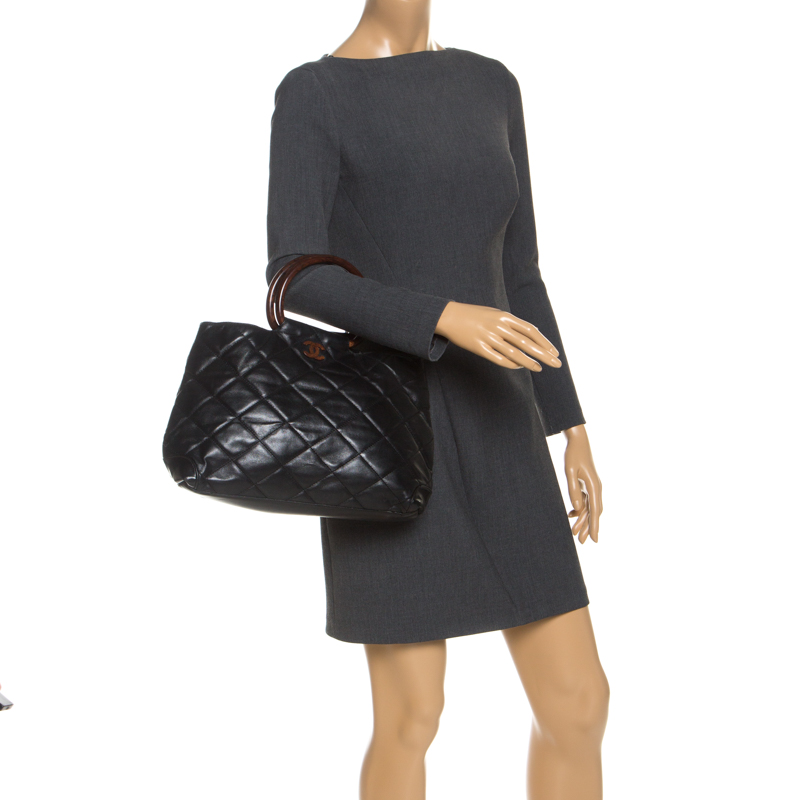 

Chanel Black Quilted Leather Resin Ring Handle Bag