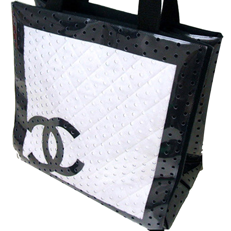 

Chanel Black/White Canvas And PVC Cruise Line Tote