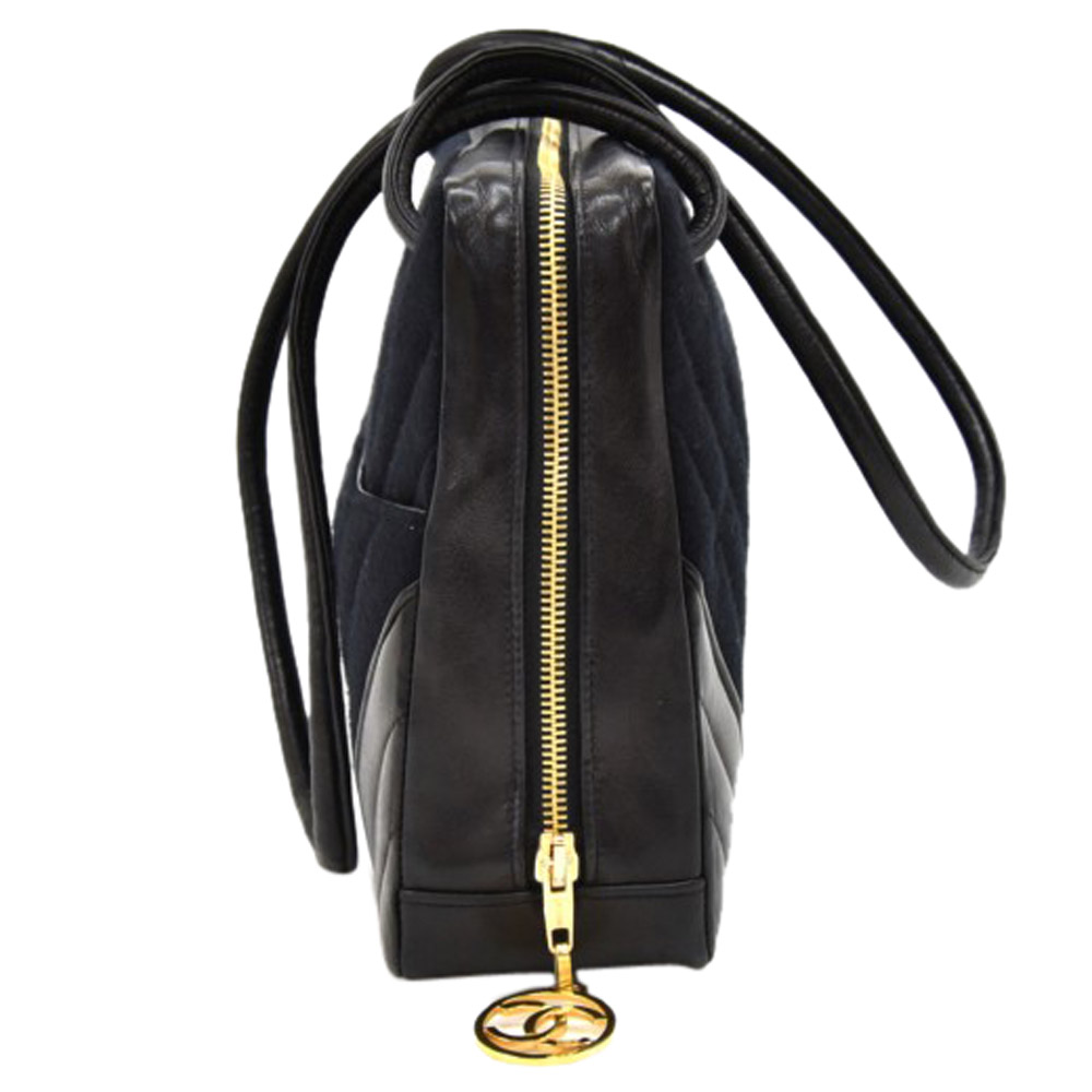 

Chanel Black V Stitched Cotton And Leather Shoulder Bag