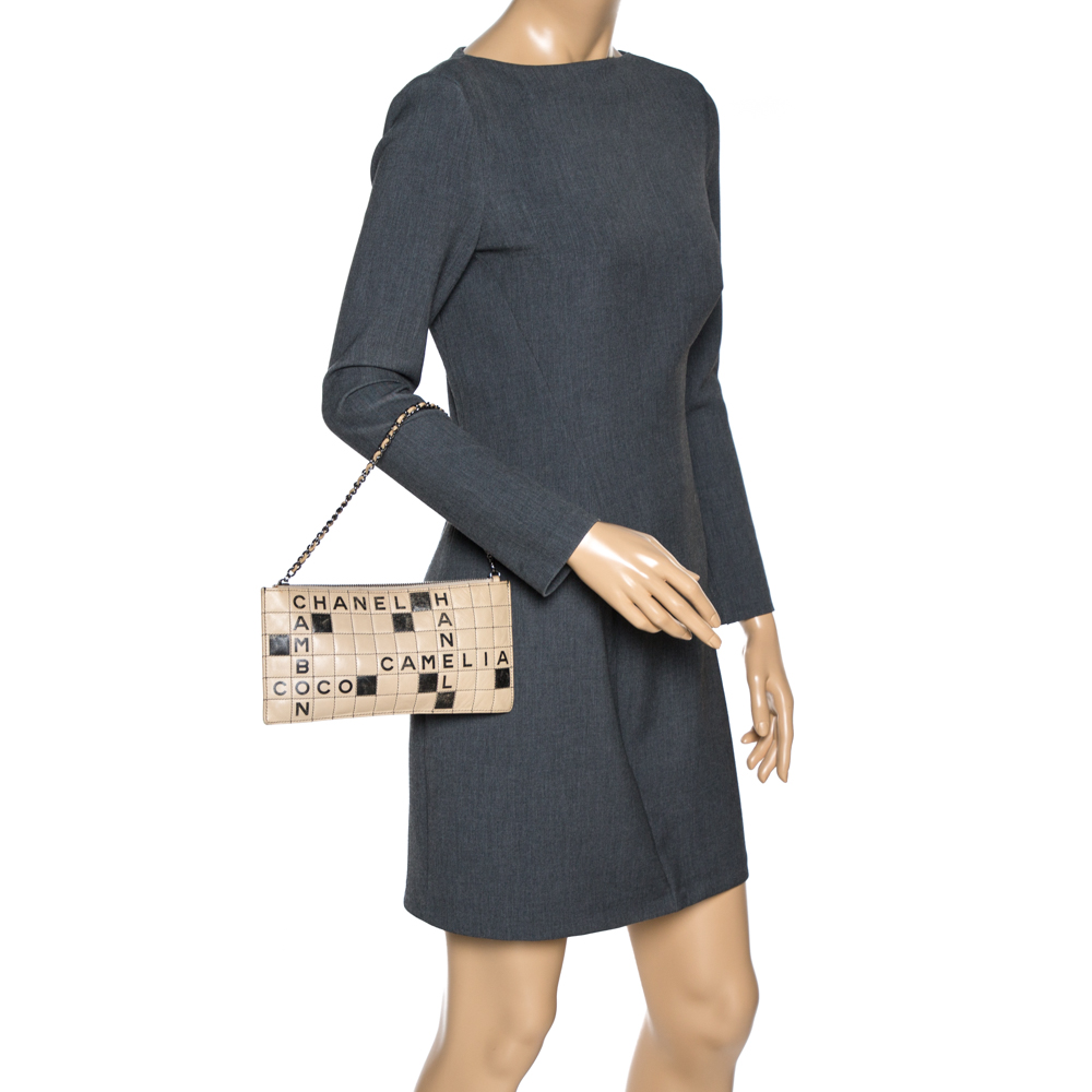 

Chanel Beige Leather Crossword Chain Clutch Bag