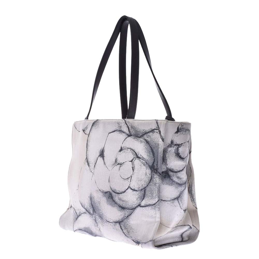 

Chanel White/Black Canvas And Leather Camellia Tote