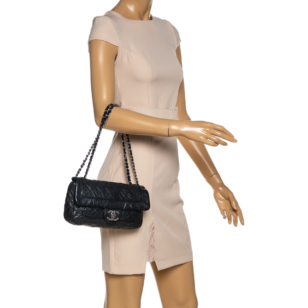 

Chanel Black Aged Quilted Leather CC Classic Single Flap Bag