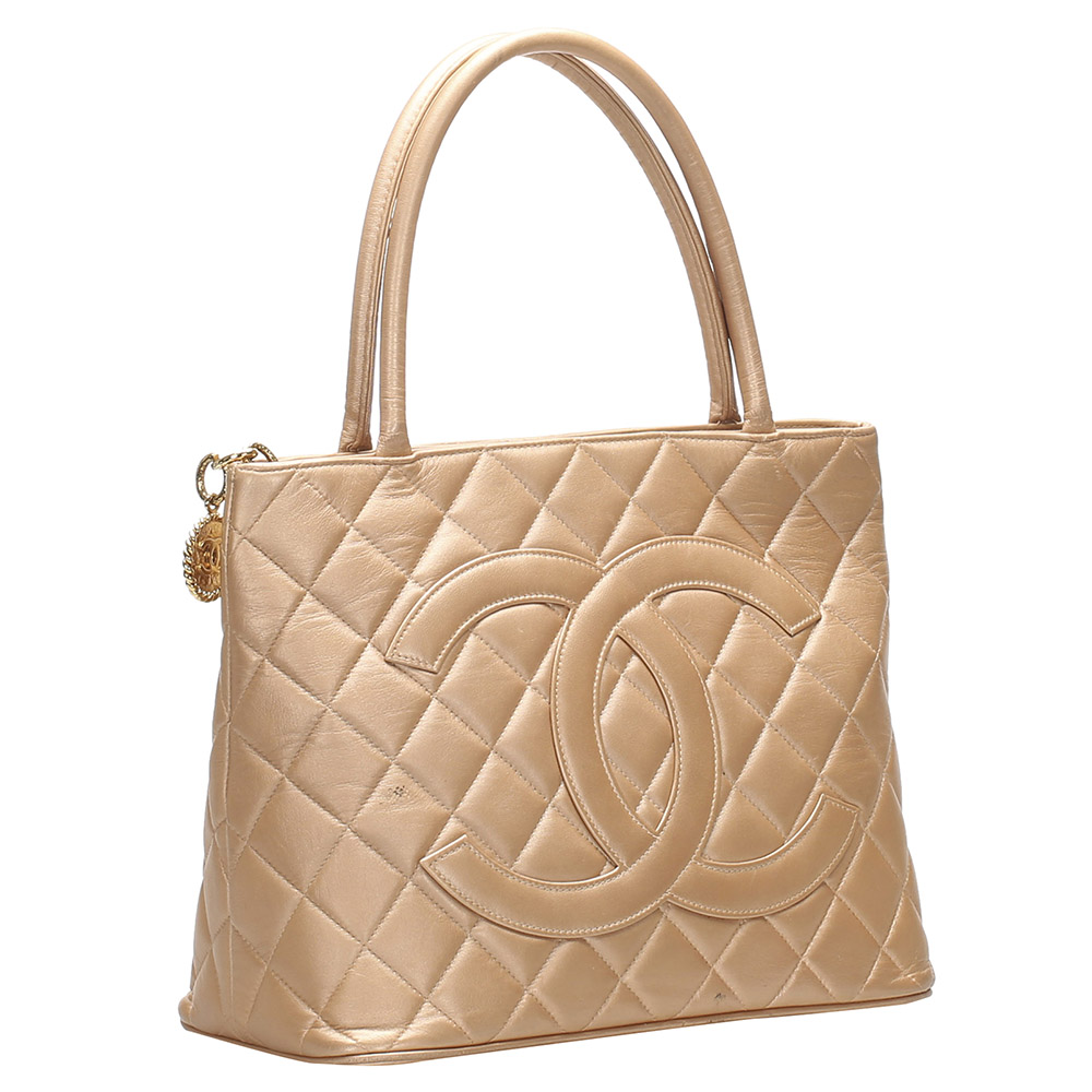 

Chanel Beige Lambskin Leather Medallion Bag, Gold