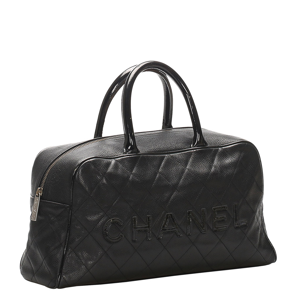 

Chanel Black Caviar Leather Travel Bag