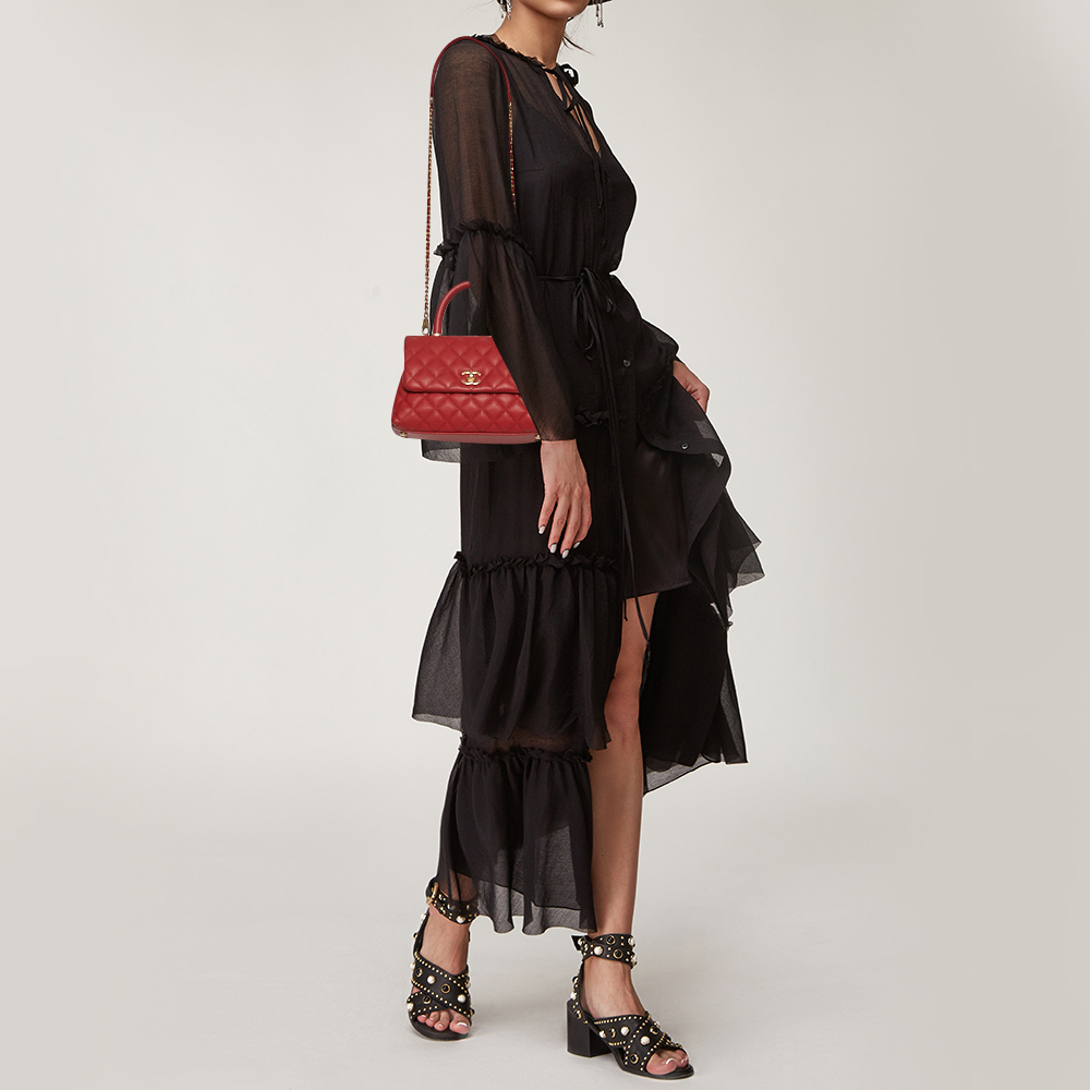 

Chanel Orange Quilted Caviar Leather Mini Coco Top Handle Bag