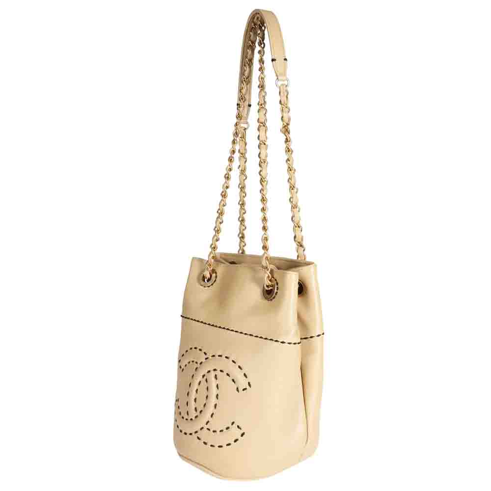 

Chanel Beige Lambskin Leather CC Stitch Drawstring Crossbody Bag