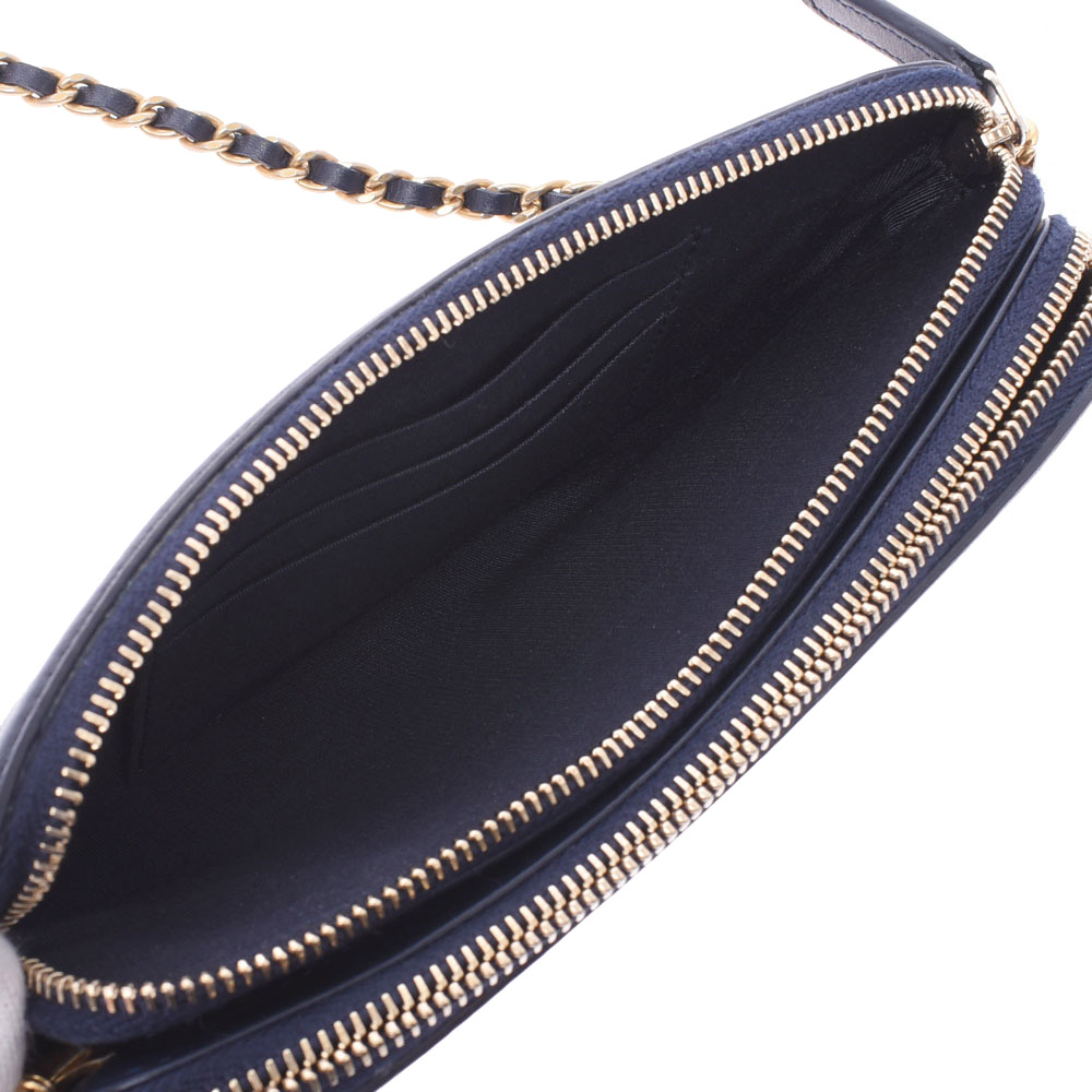 

Chanel Navy Blue Caviar Leather Filigree Clutch